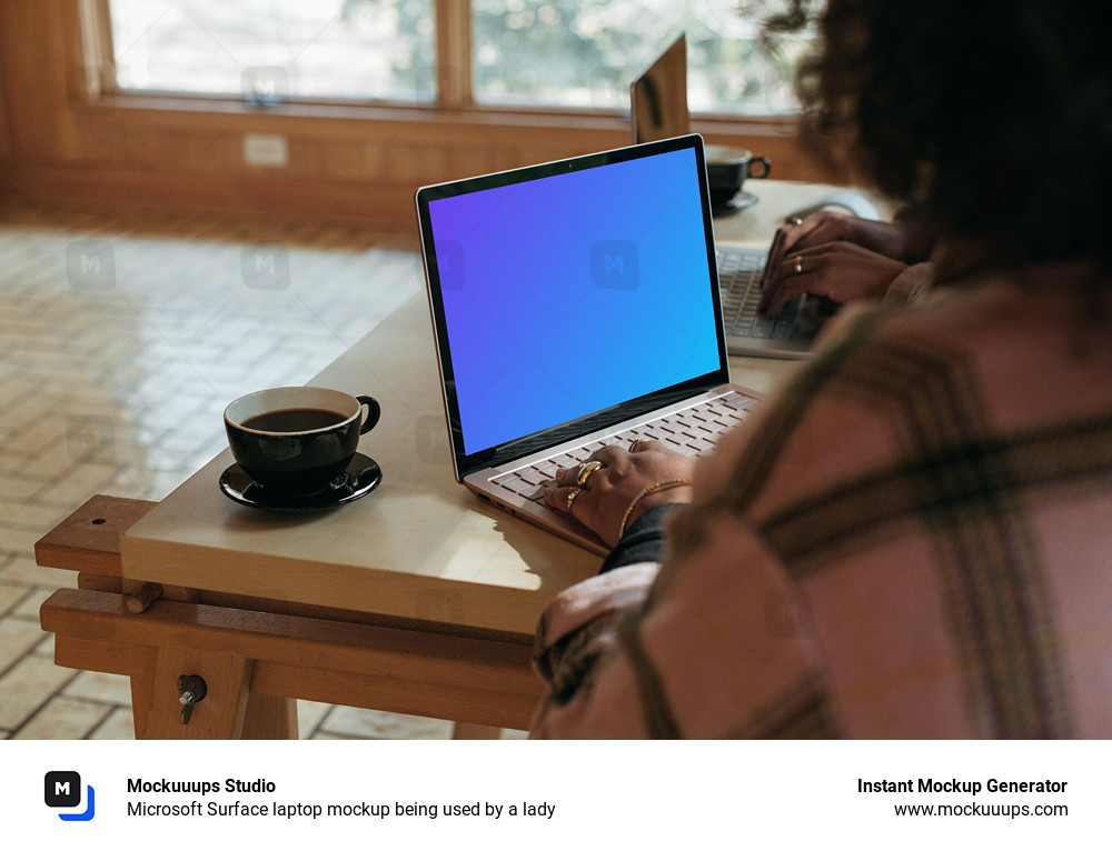 Microsoft Surface laptop mockup being used by a lady