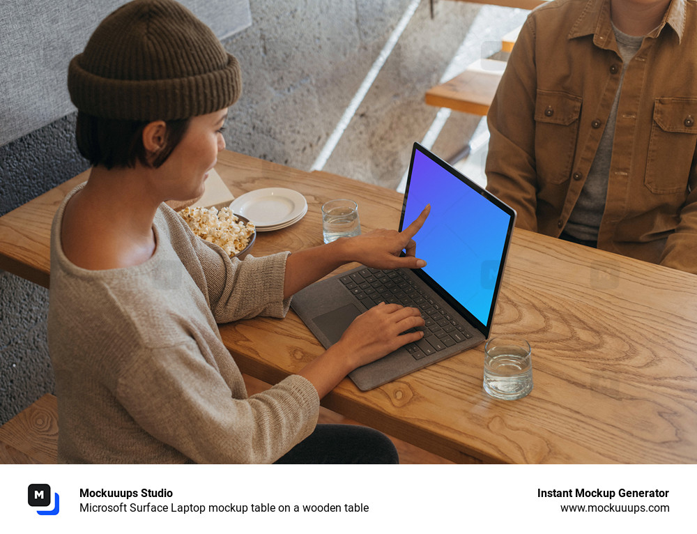 Microsoft Surface Laptop mockup table on a wooden table