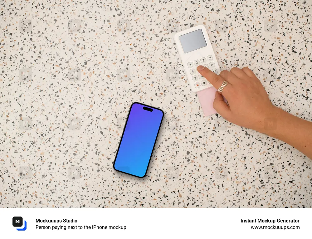 Person paying next to the iPhone mockup
