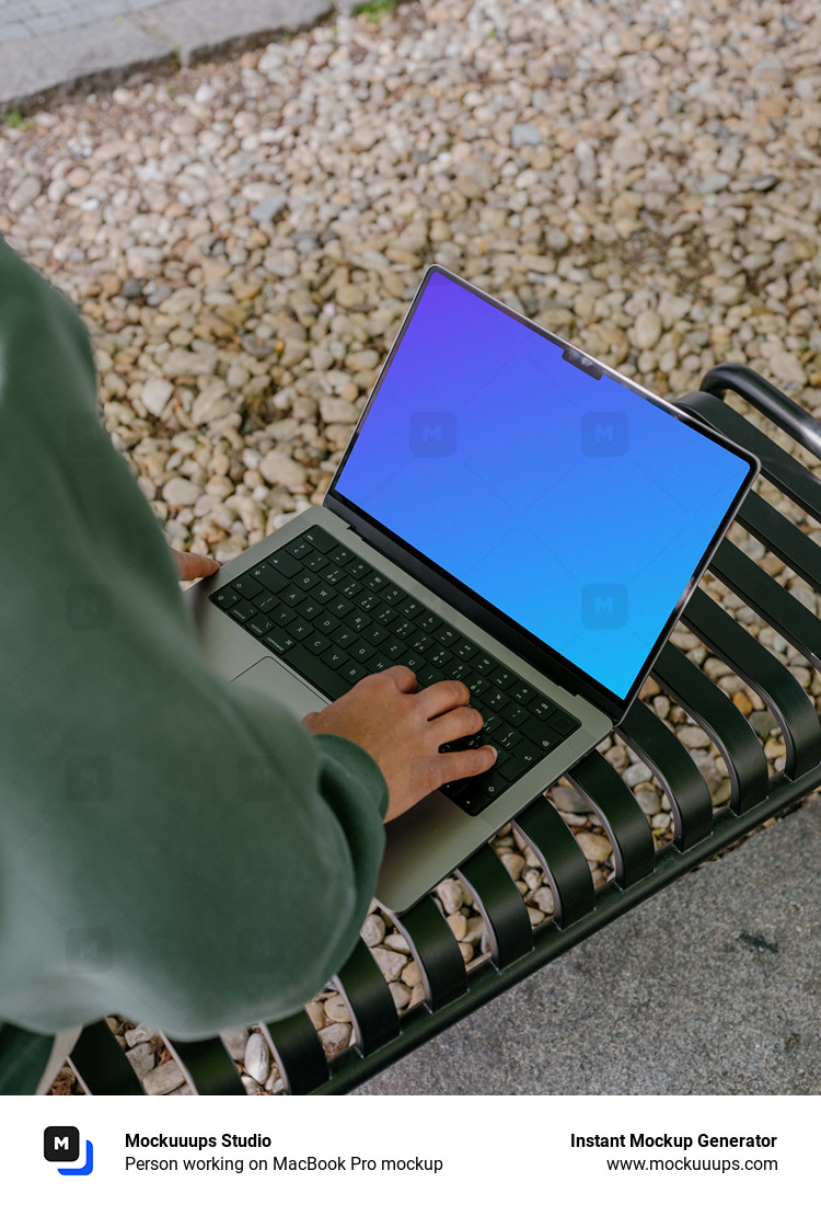 Person working on MacBook Pro mockup