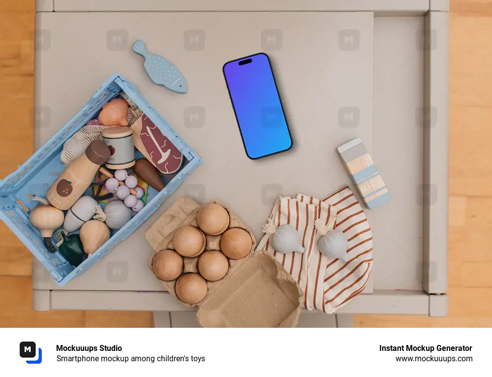 Smartphone mockup among children's toys