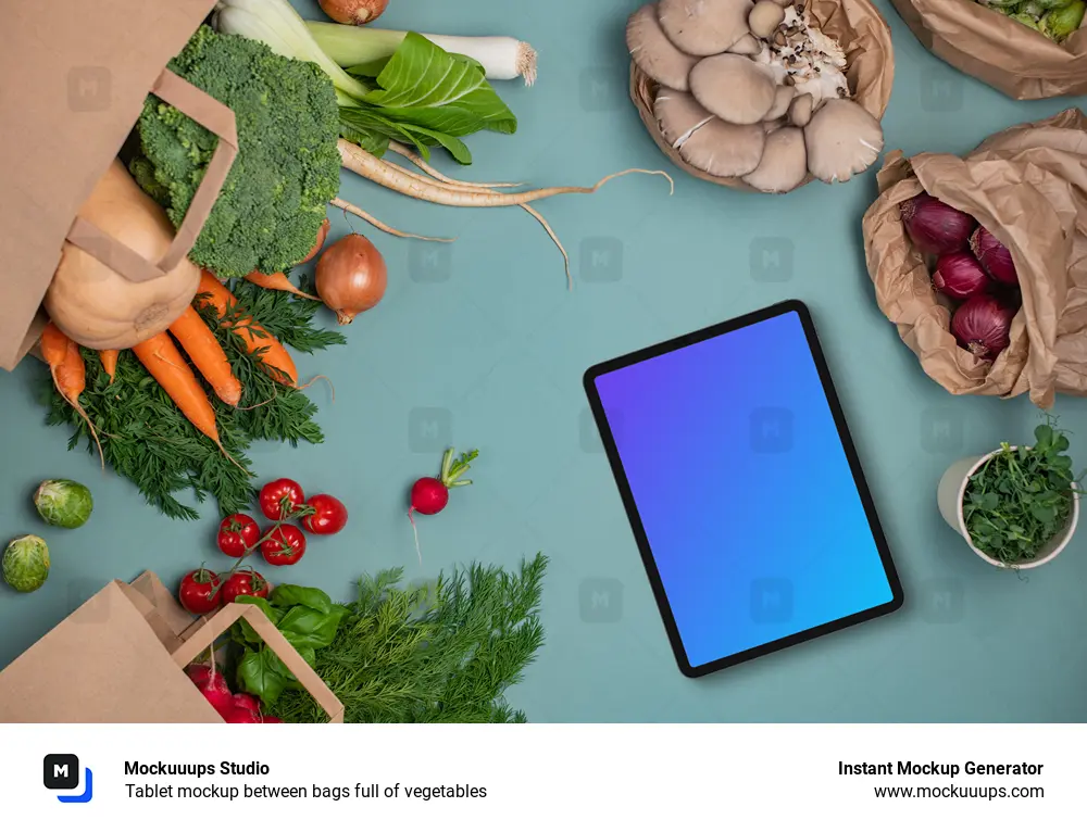 Tablet mockup between bags full of vegetables