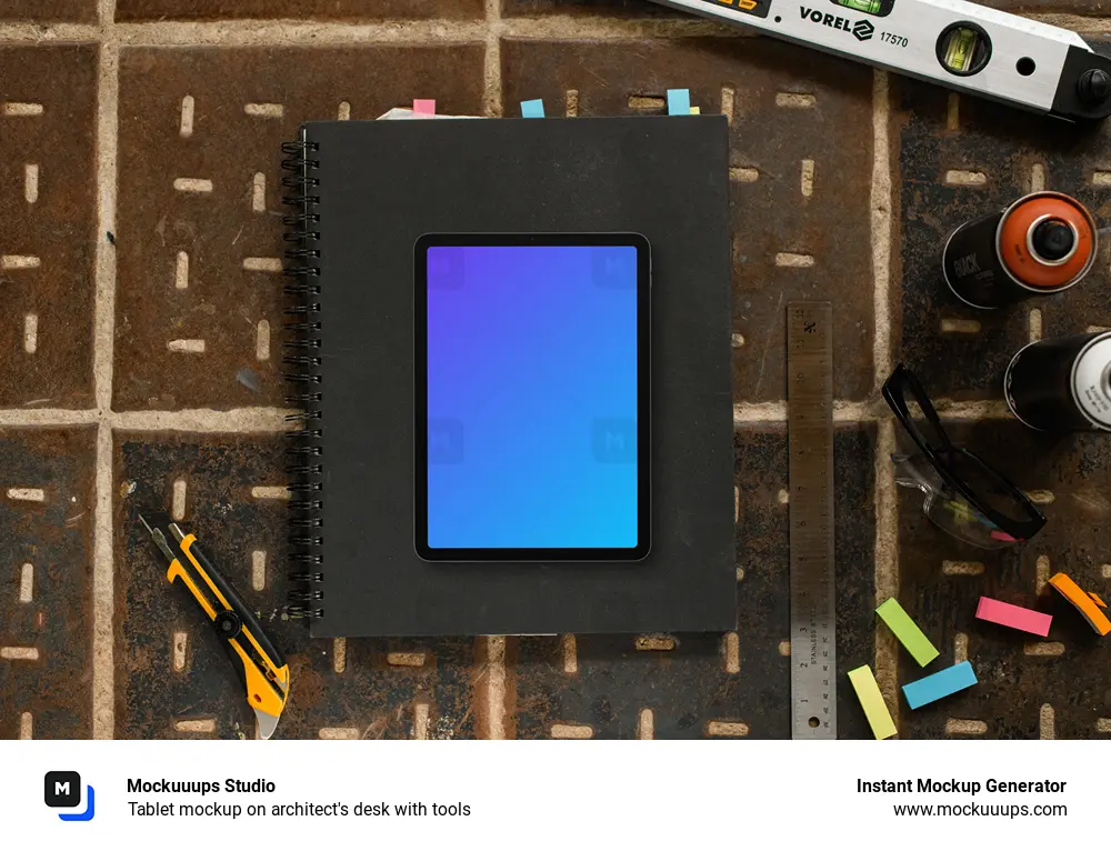 Tablet mockup on architect's desk with tools