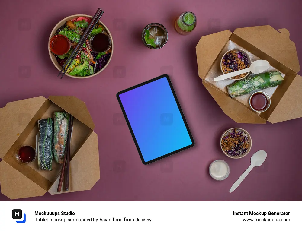 Tablet mockup surrounded by Asian food from delivery