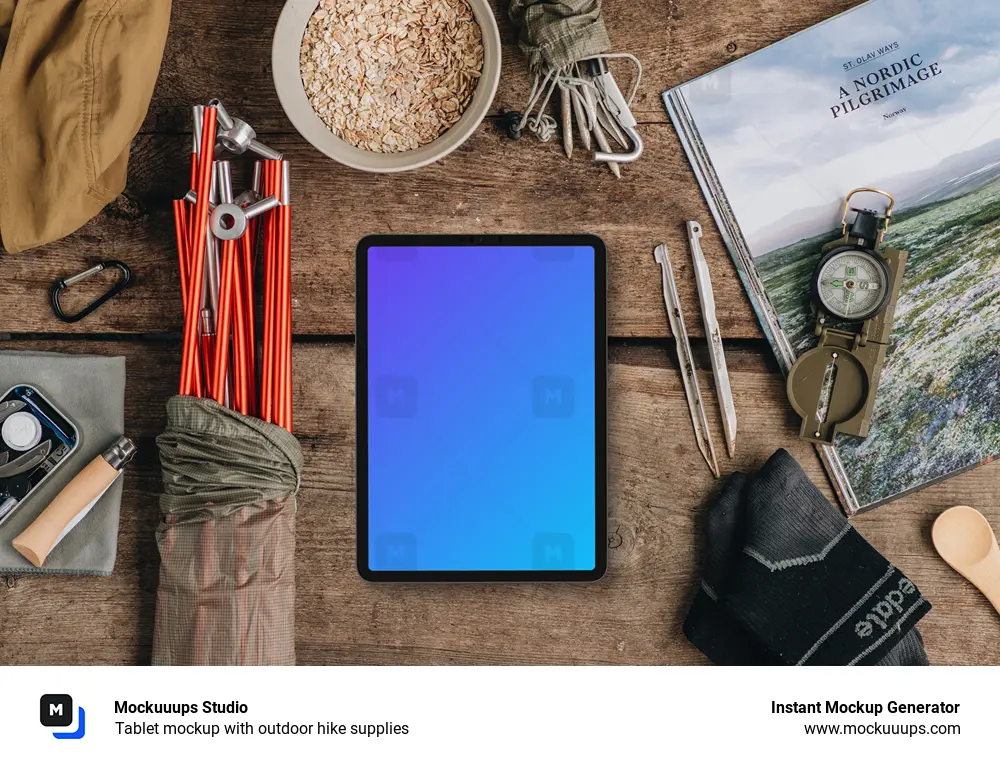 Tablet mockup with outdoor hike supplies