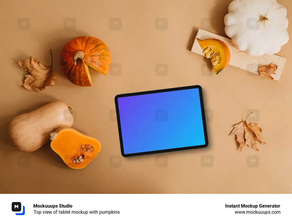 Top view of tablet mockup with pumpkins