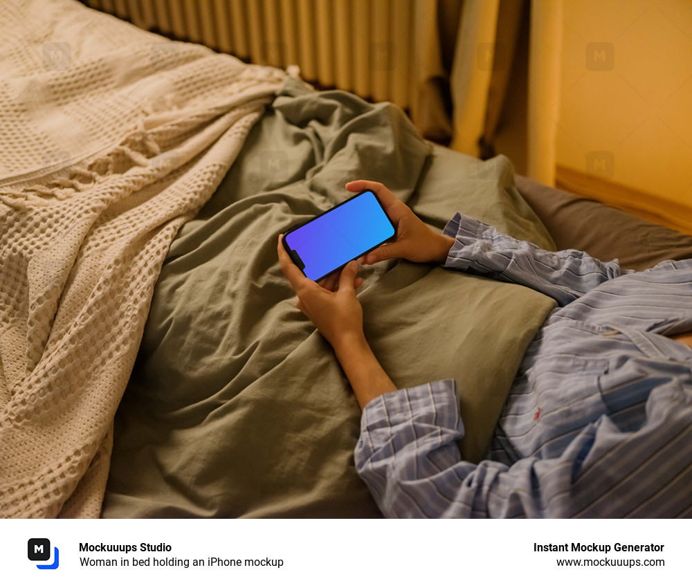 Woman in bed holding an iPhone mockup