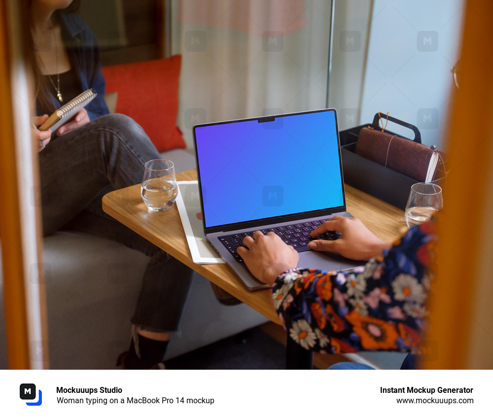 Woman typing on a MacBook Pro 14 mockup