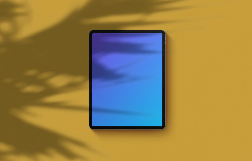 Download Ipad Pro Mockup On Yellow Background Landscape Shadow 1 Mockuuups Studio