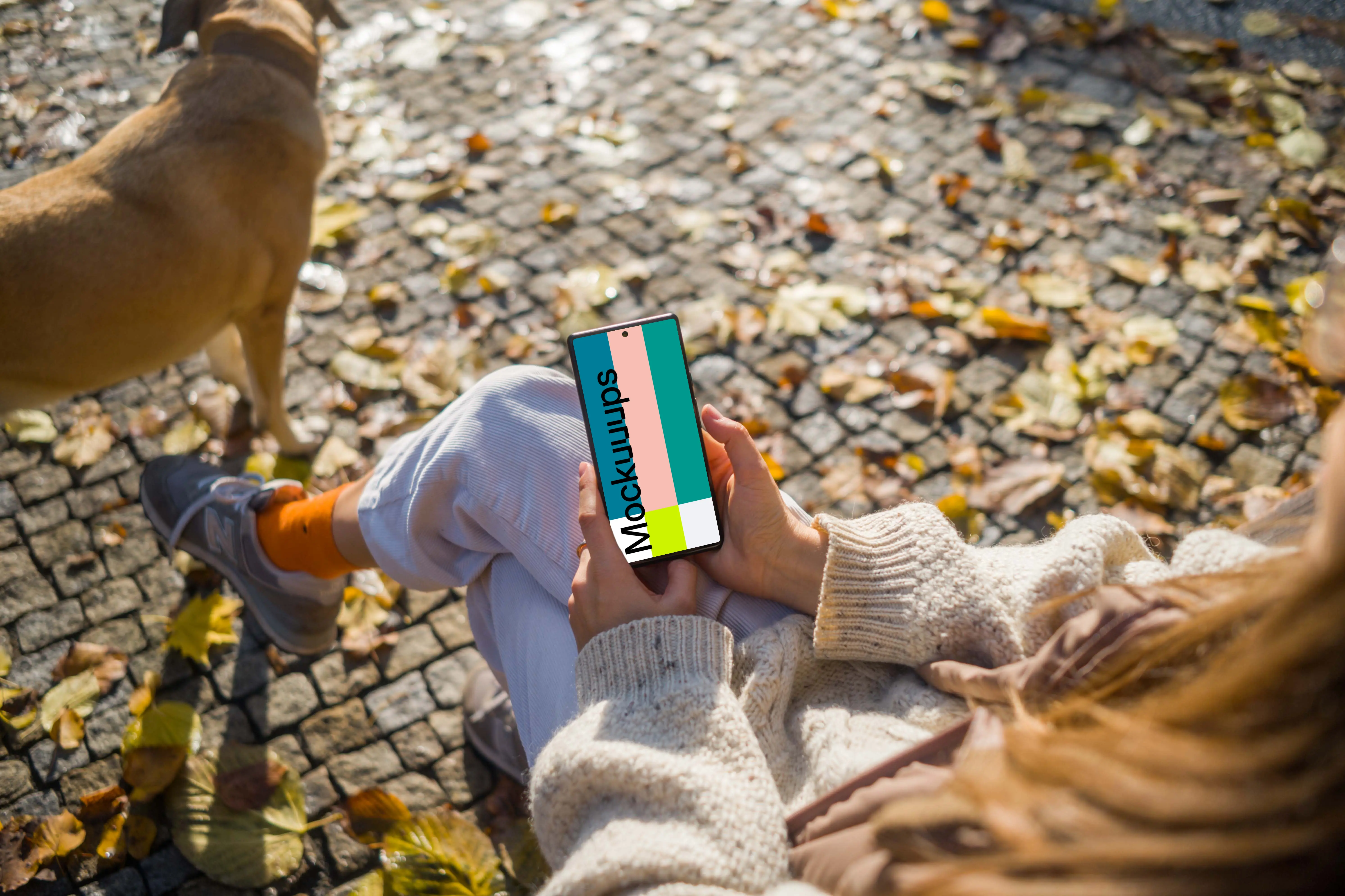 Female hands holding a Google Pixel 6 in autumn theme mockup