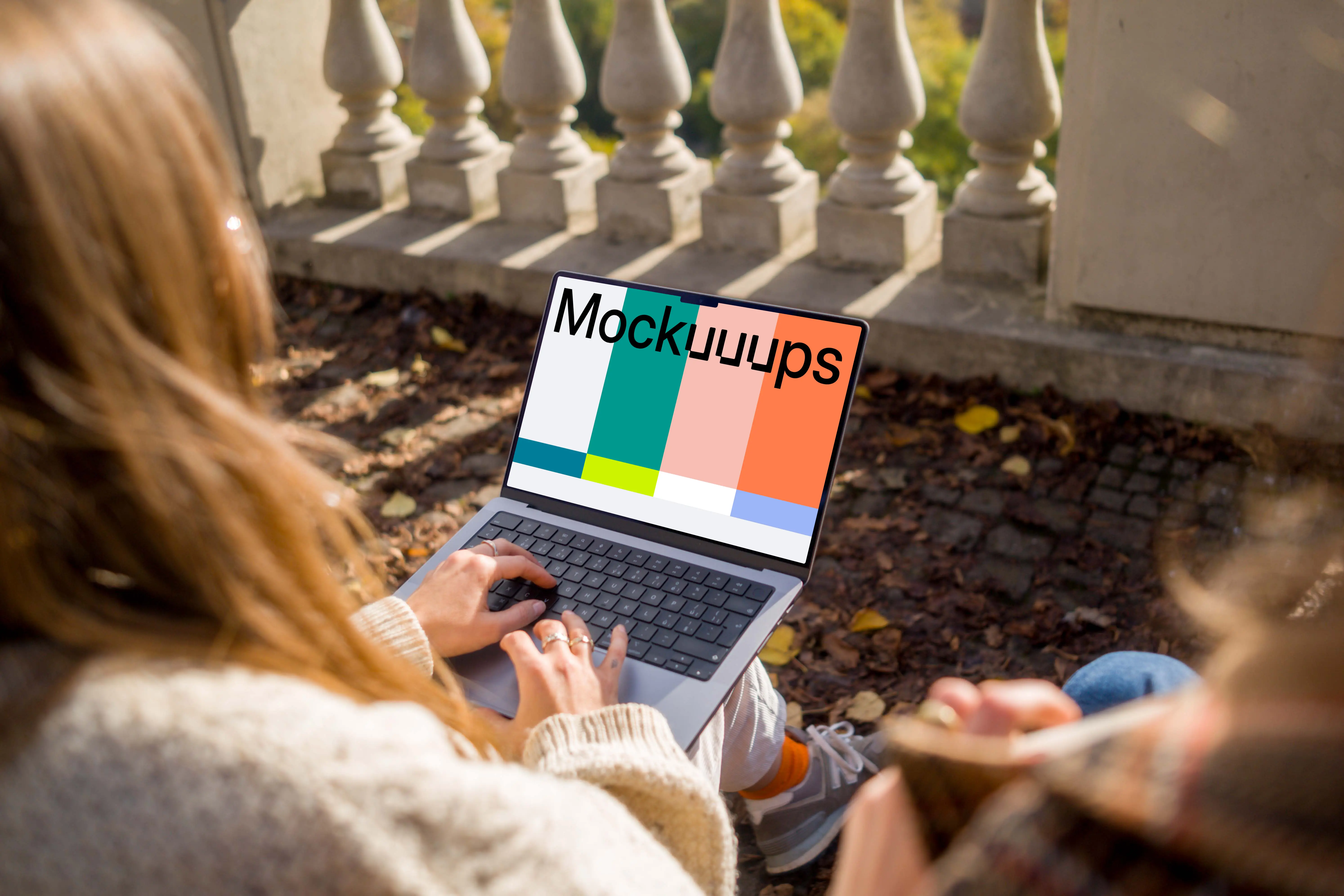 Female working on a MacBook Pro 14 in autumn theme mockup