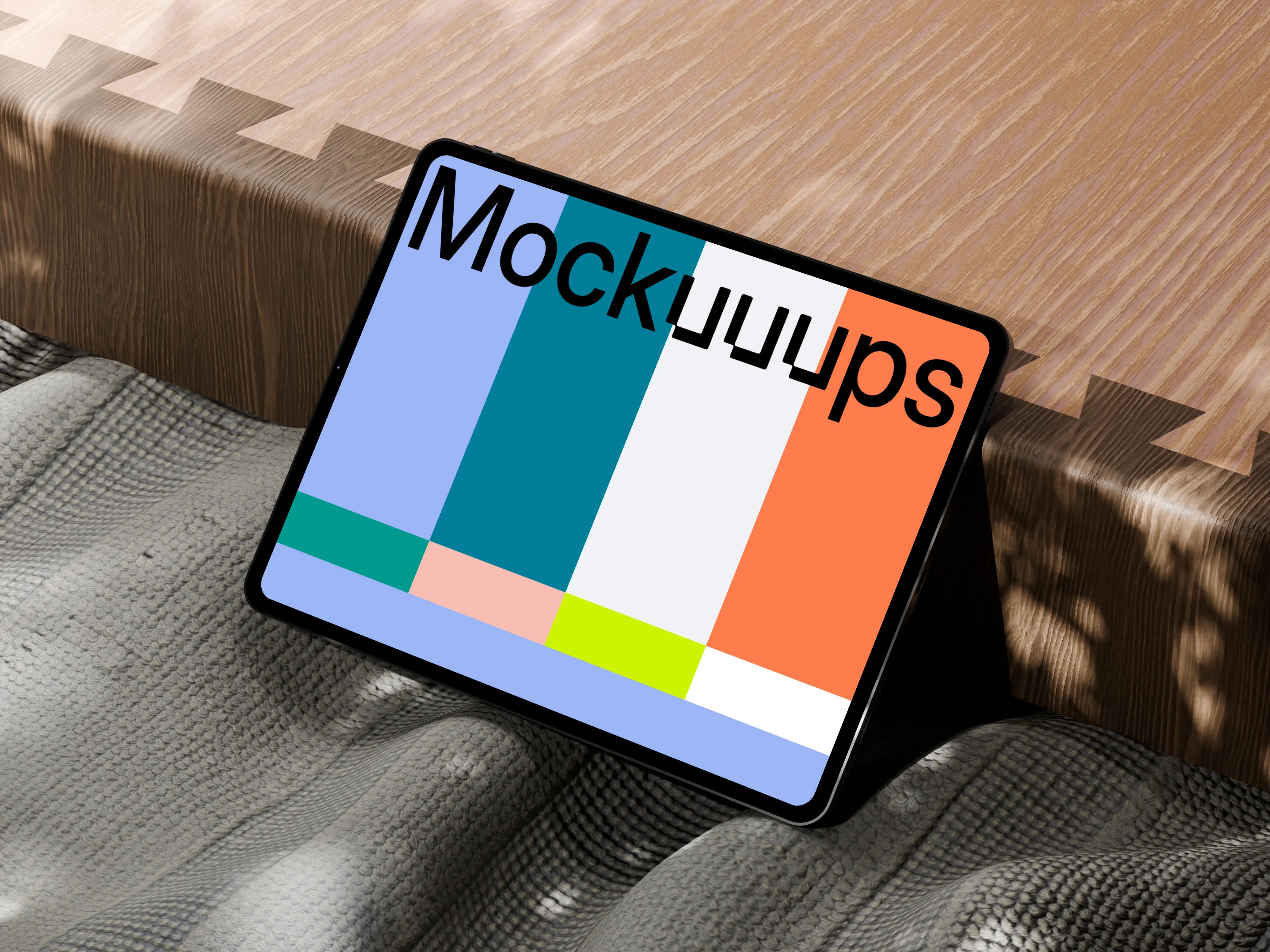 Free iPad Pro mockup on textured fabric and wooden surface