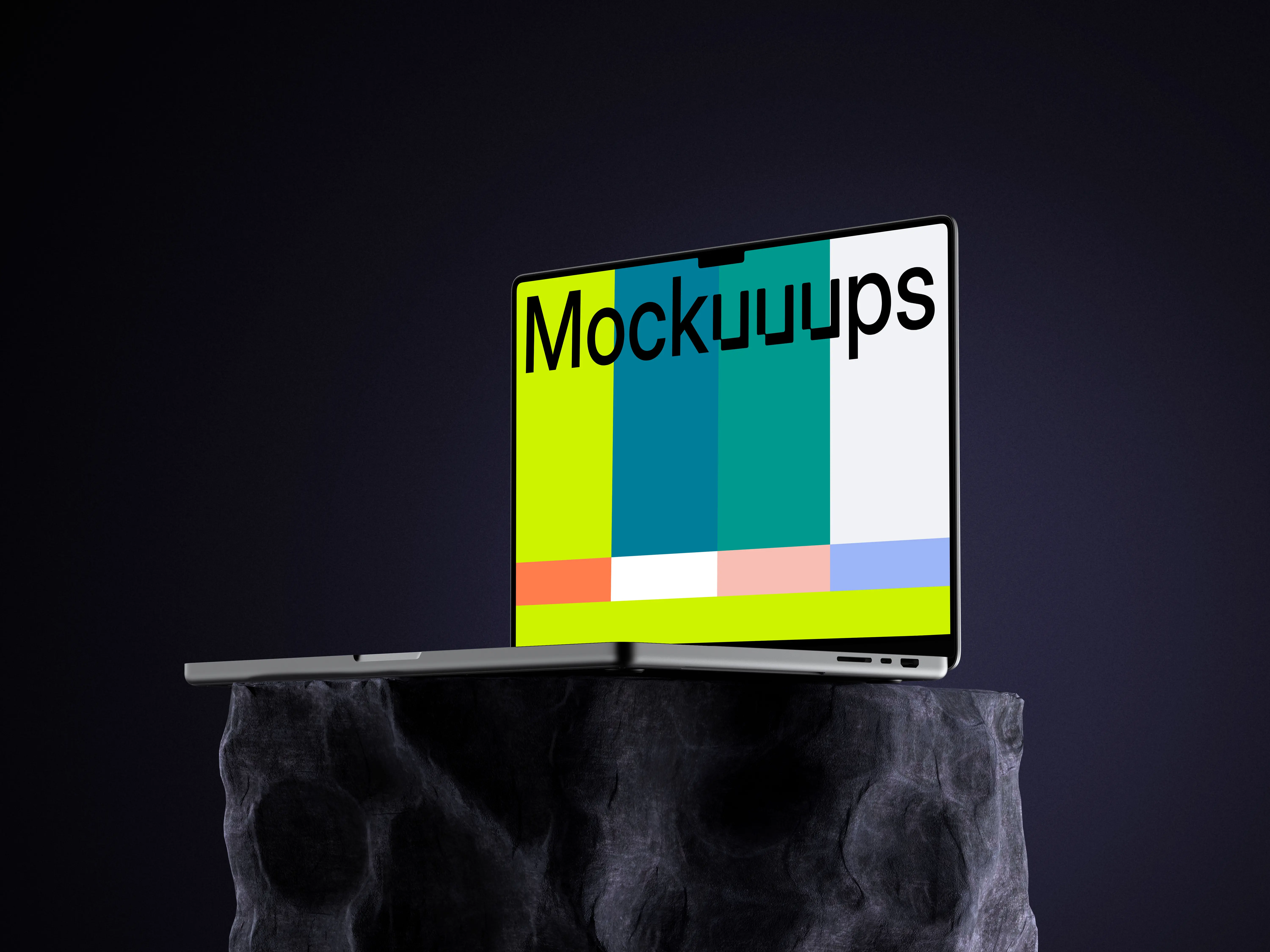 Free MacBook Pro mockup on stone pedestal