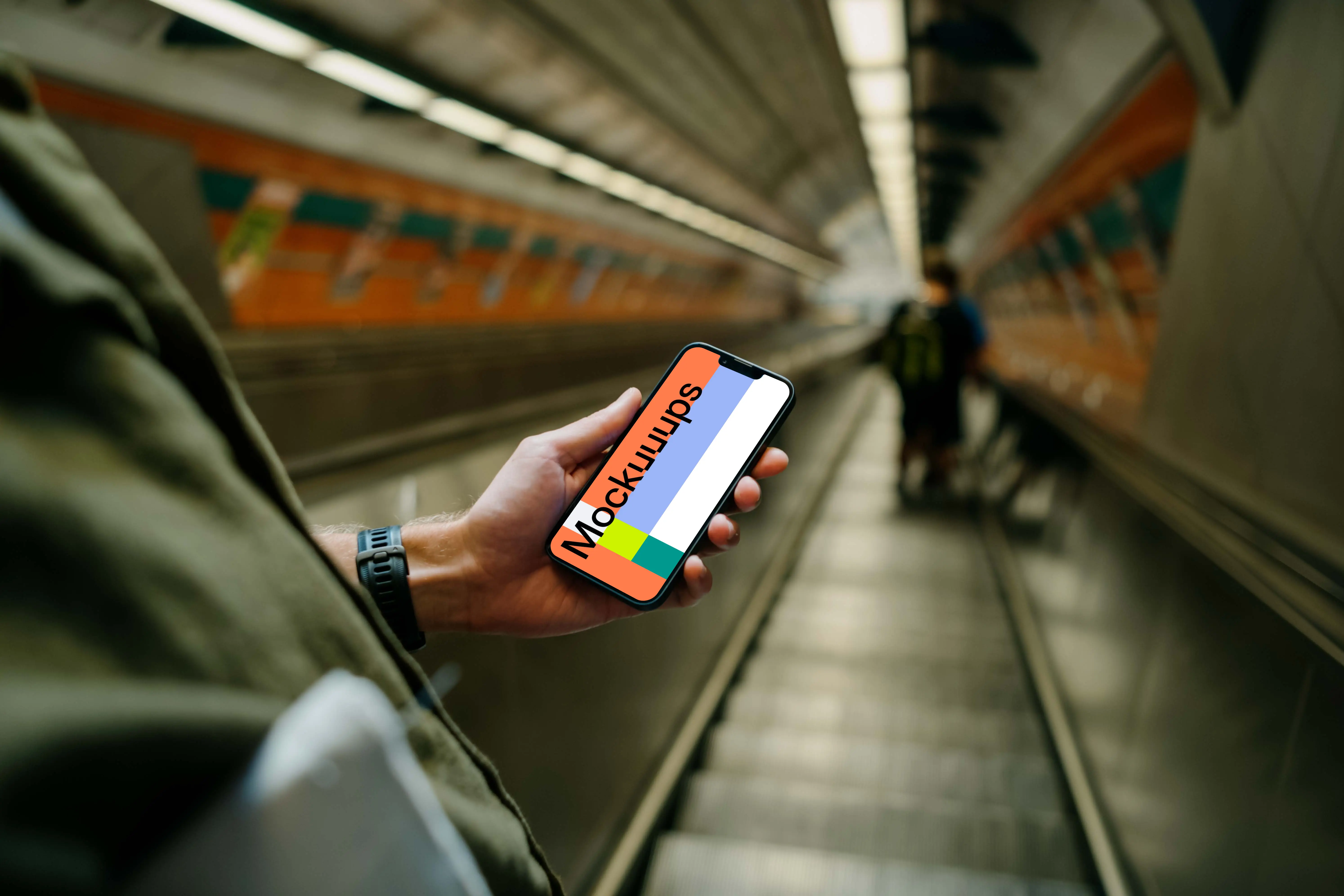 Hand holding a phone mockup