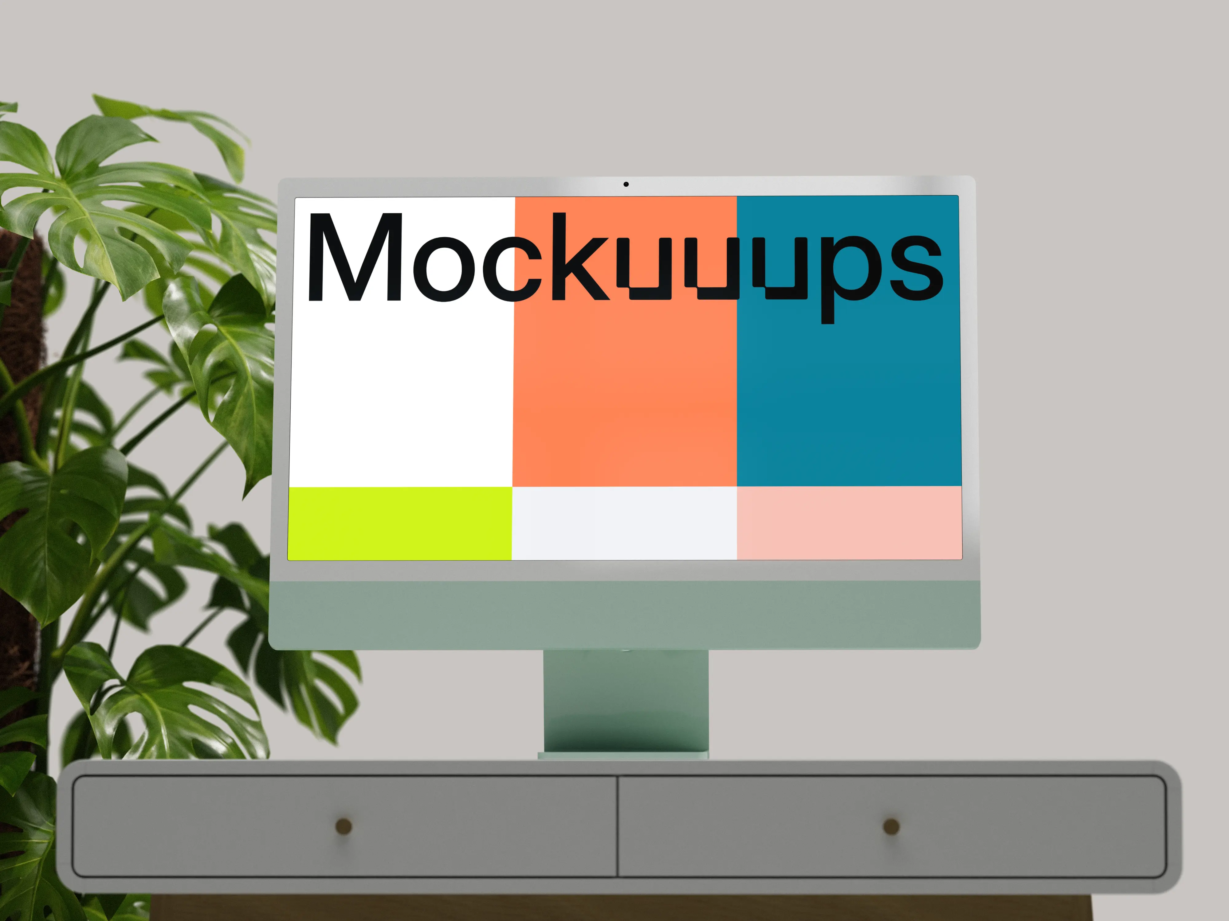 iMac mockup on a minimalist desk with plants