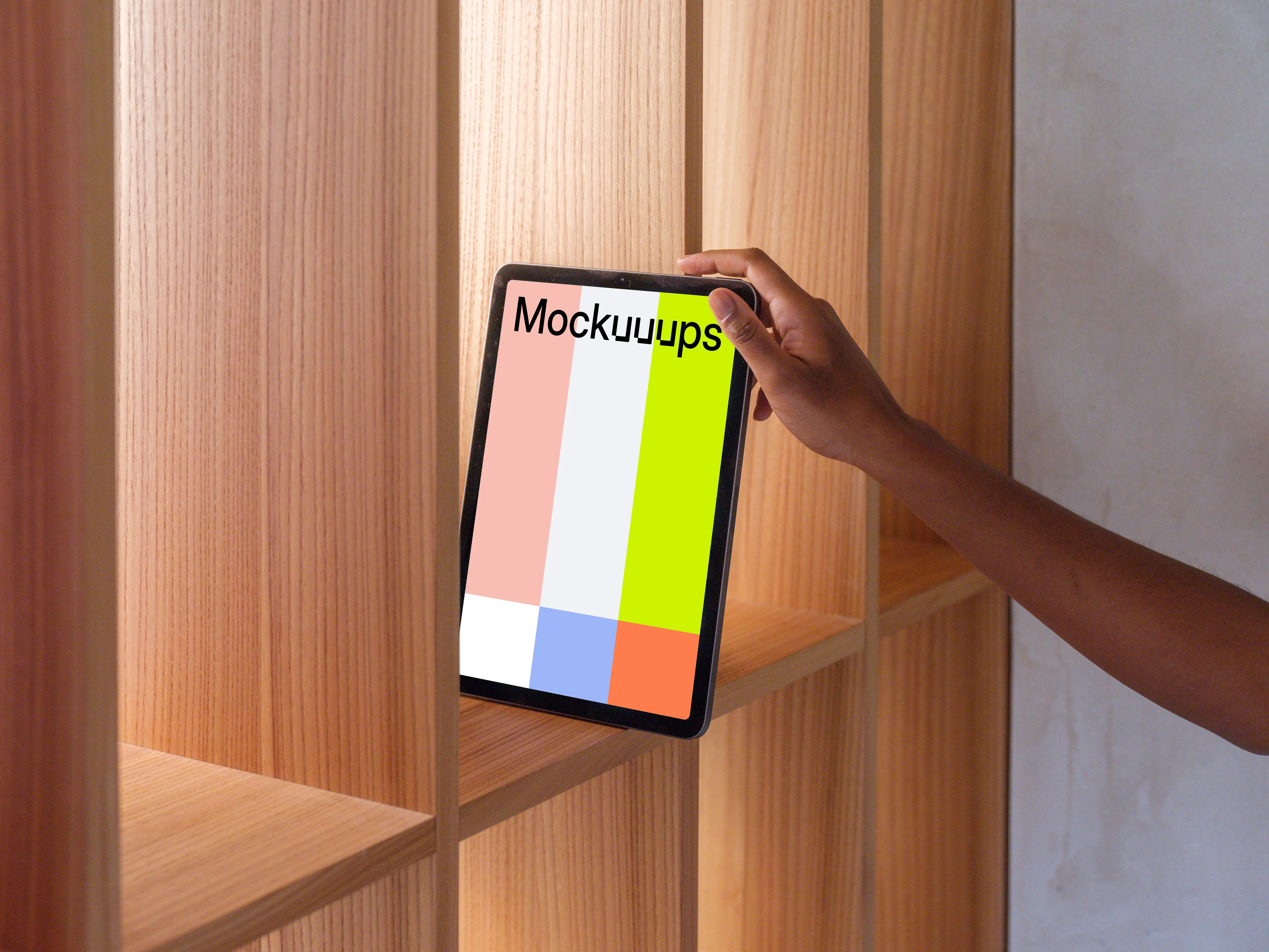 iPad Air mockup held against a wooden shelf
