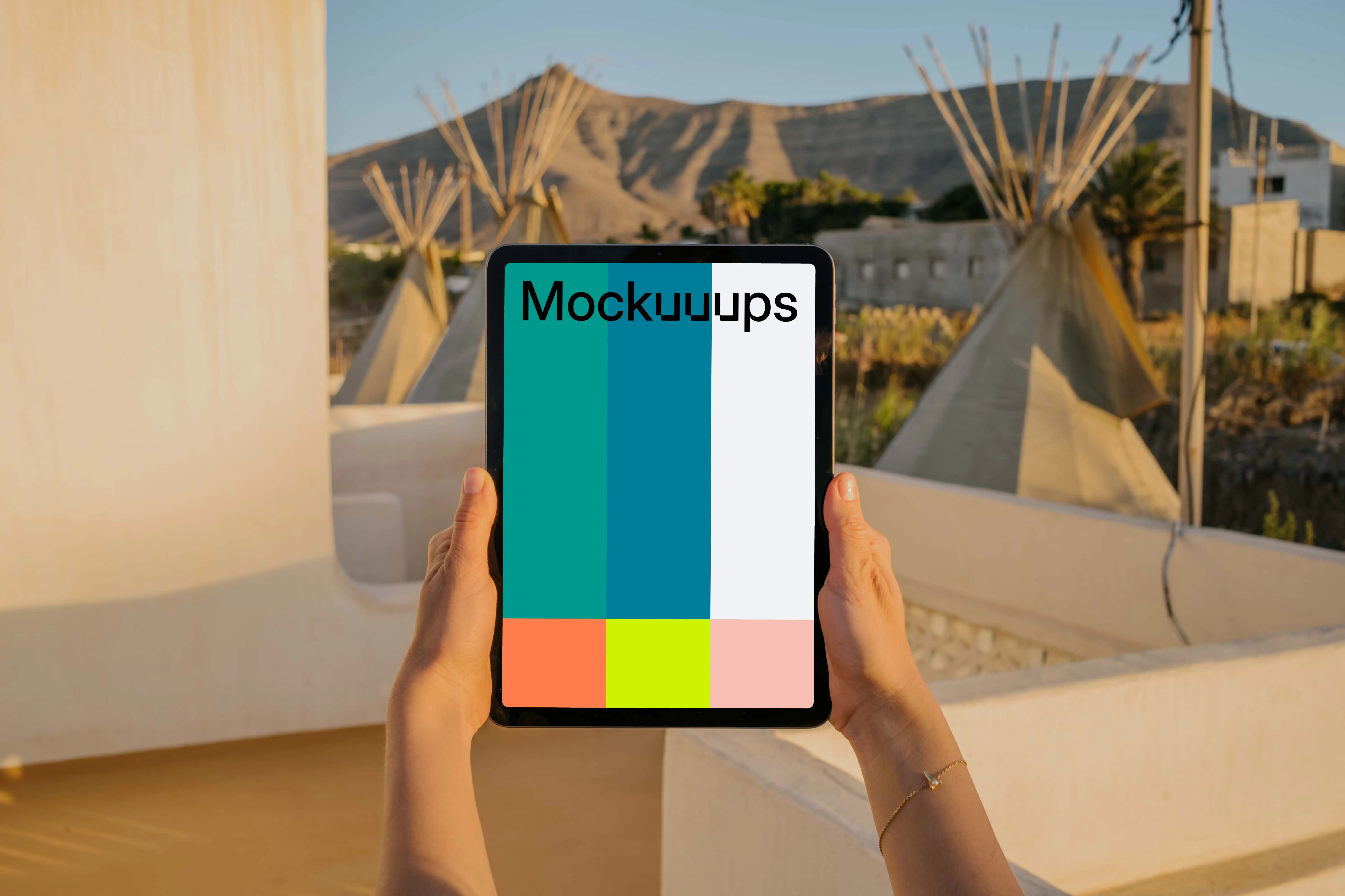 iPad Air mockup held up by a user