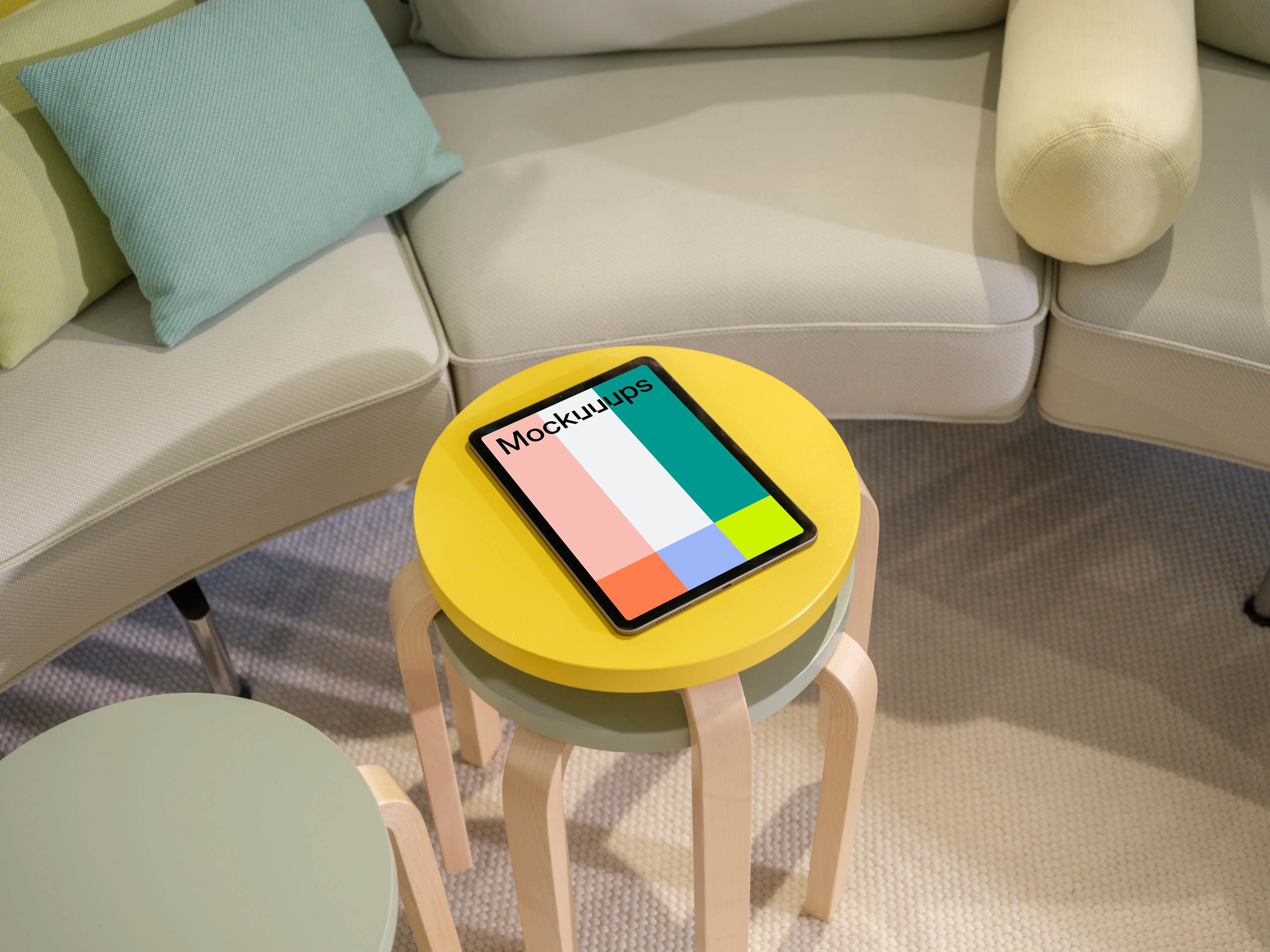 iPad Air mockup on a modern living room side table
