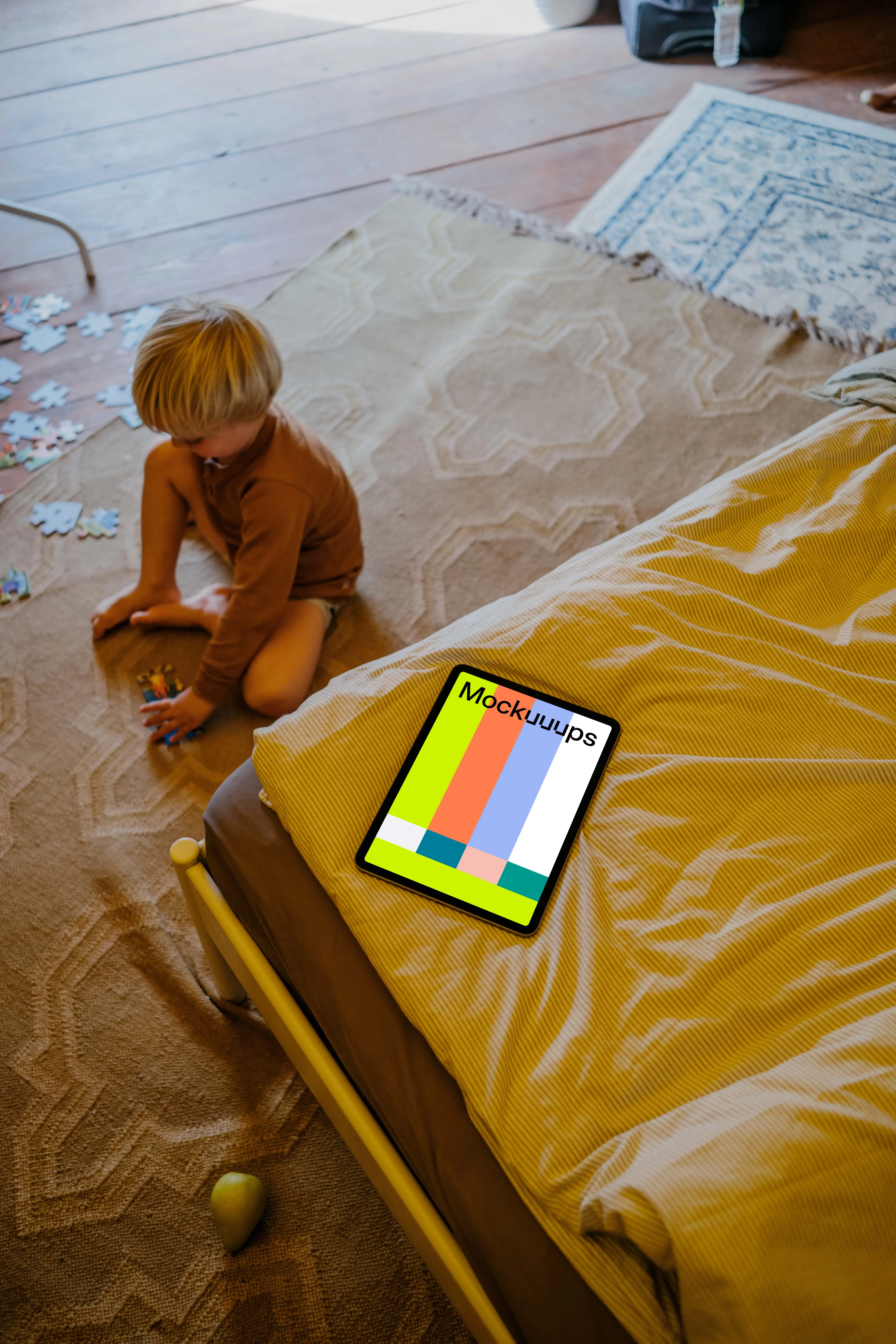 iPad Air mockup placed on a bed
