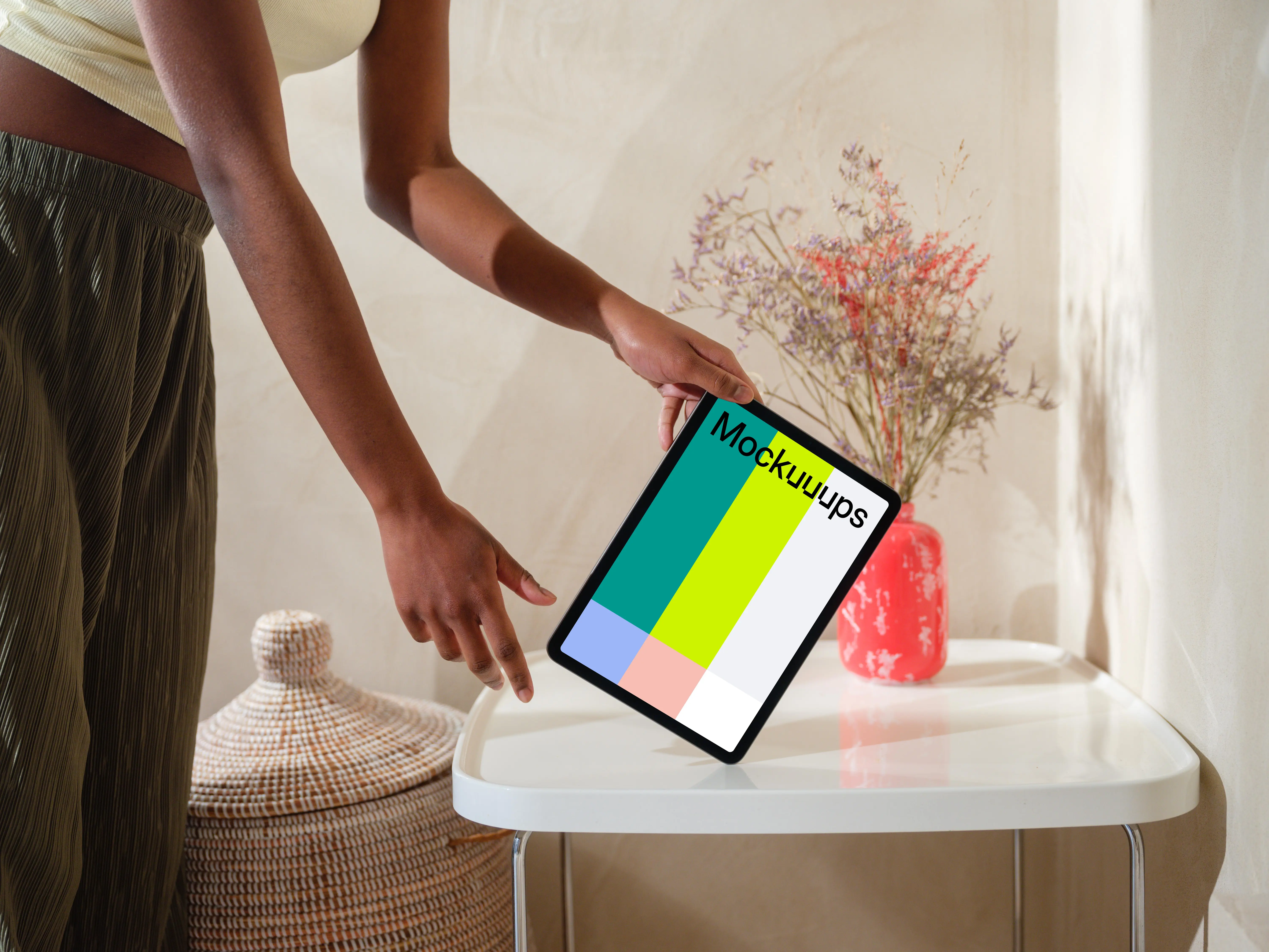 iPad Air mockup with female hand on a modern white table