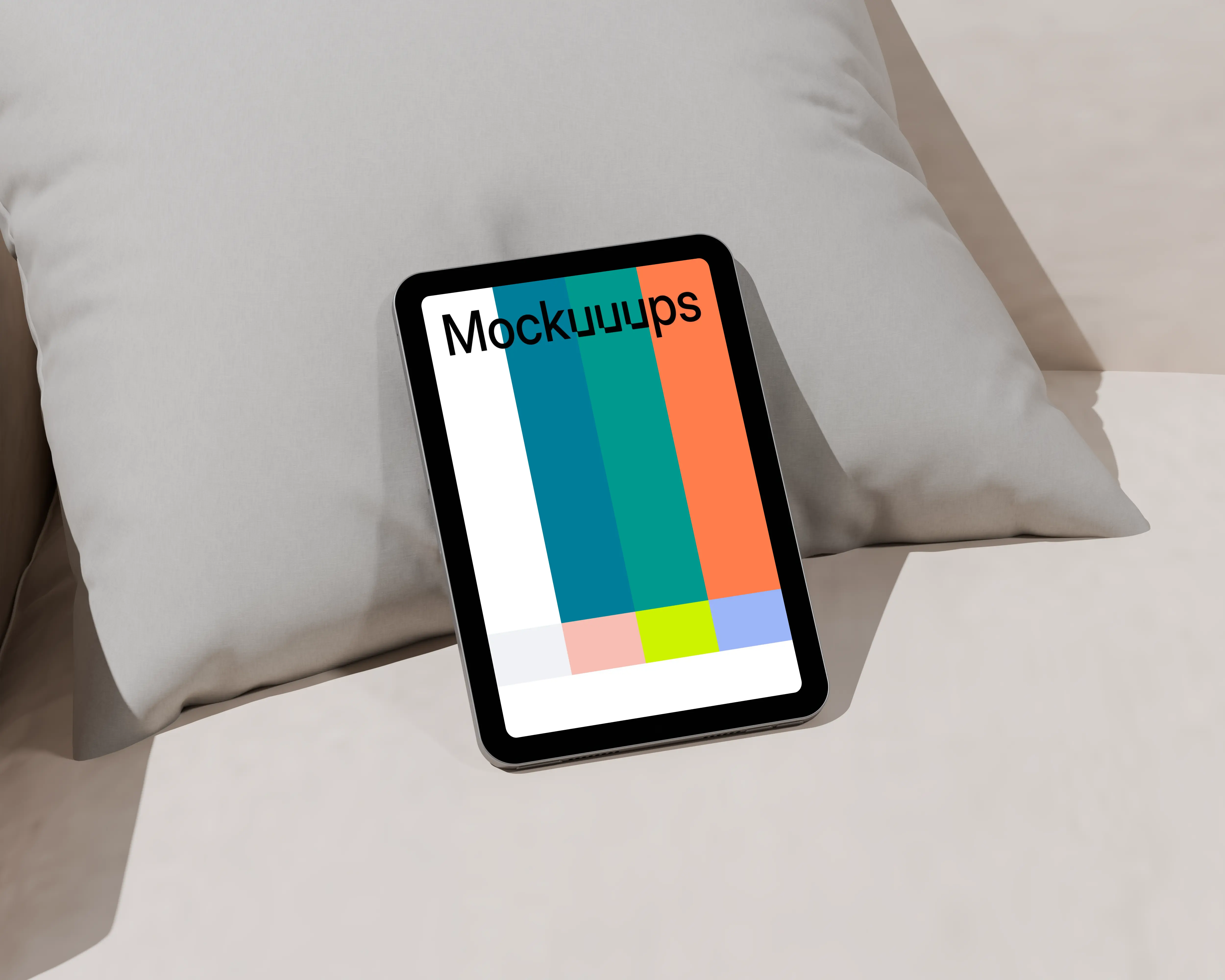 iPad mini mockup on a modern sofa cushion