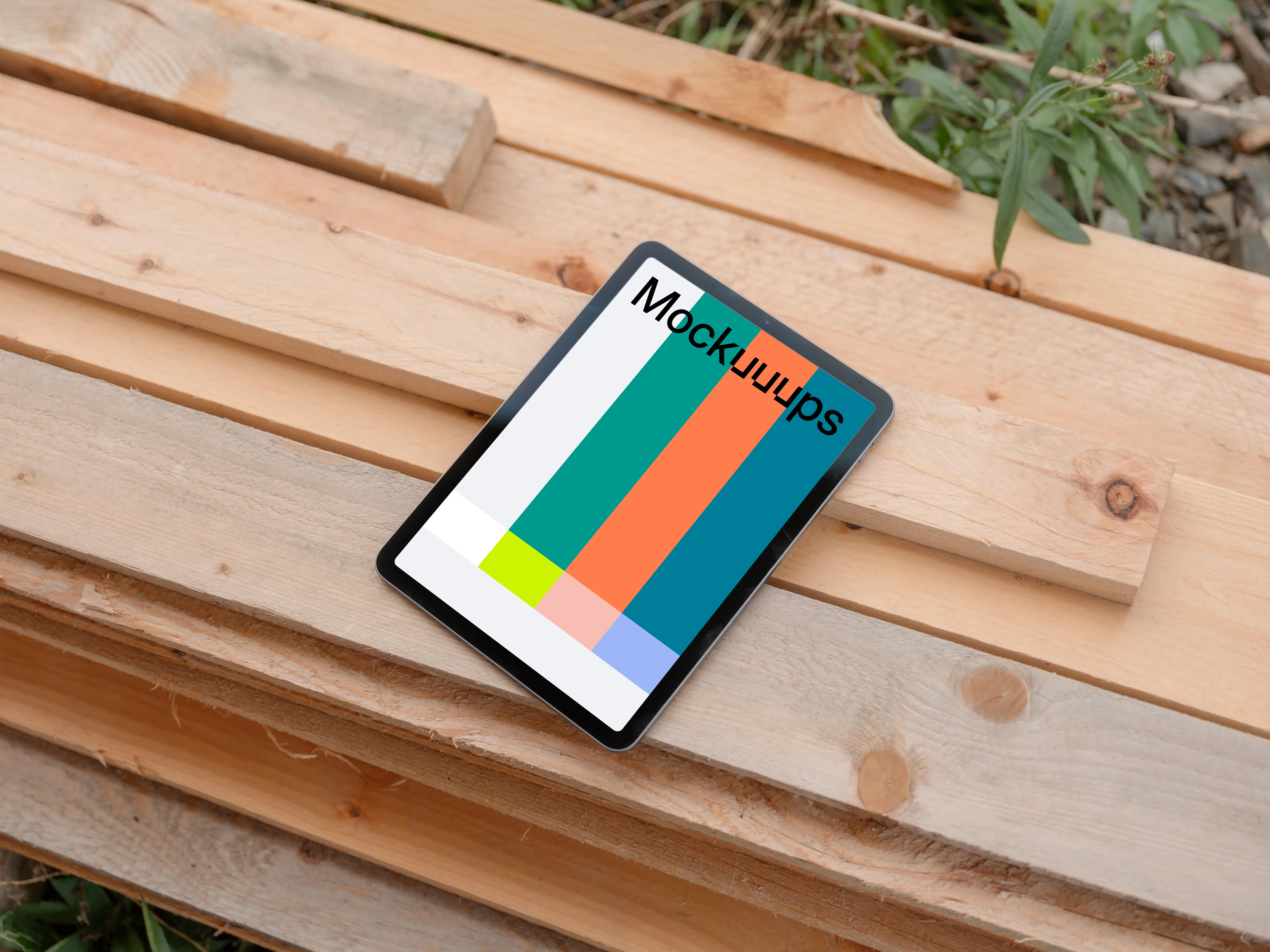 iPad mockup on wooden boards