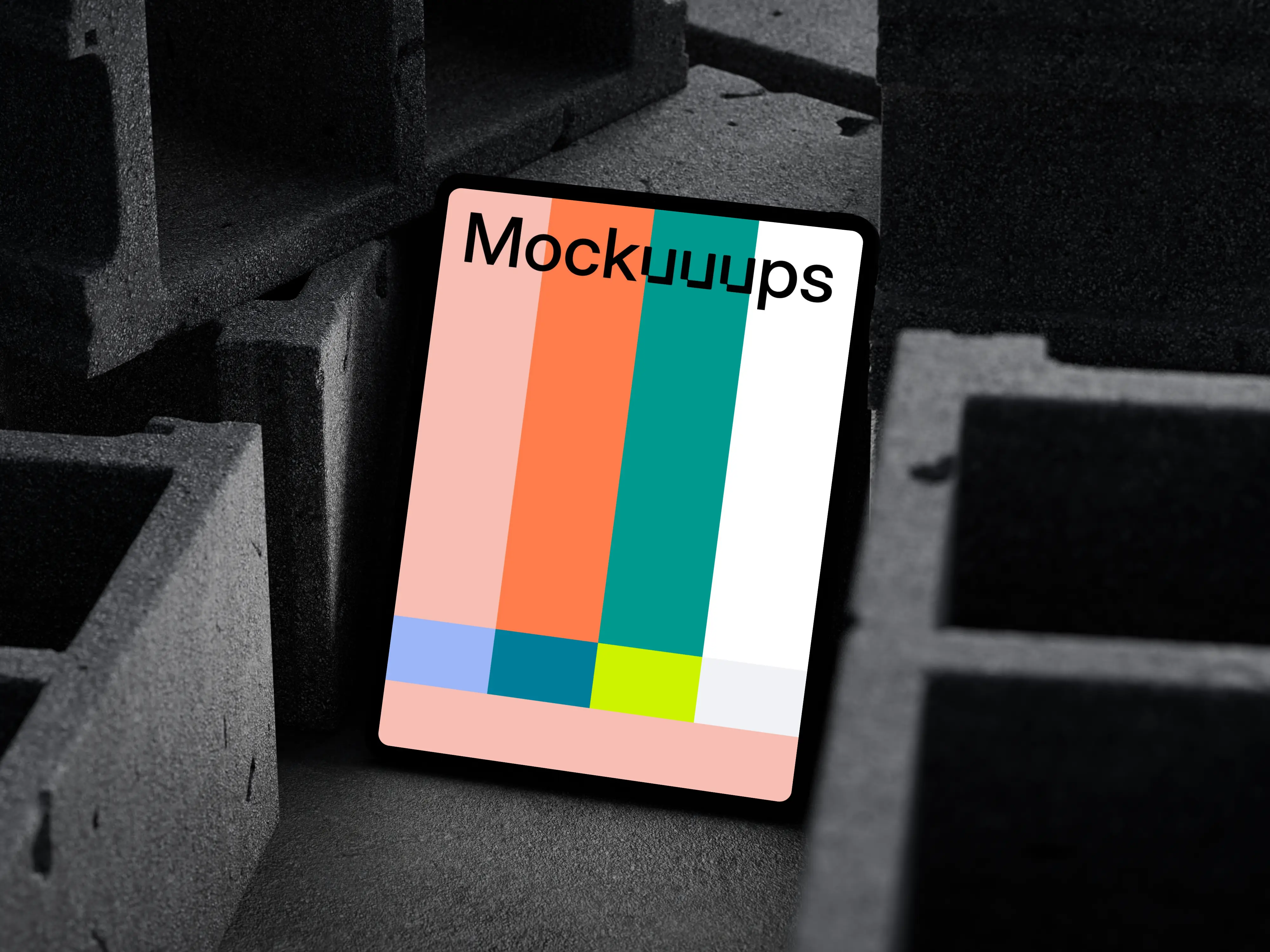 iPad Pro mockup placed on textured concrete blocks