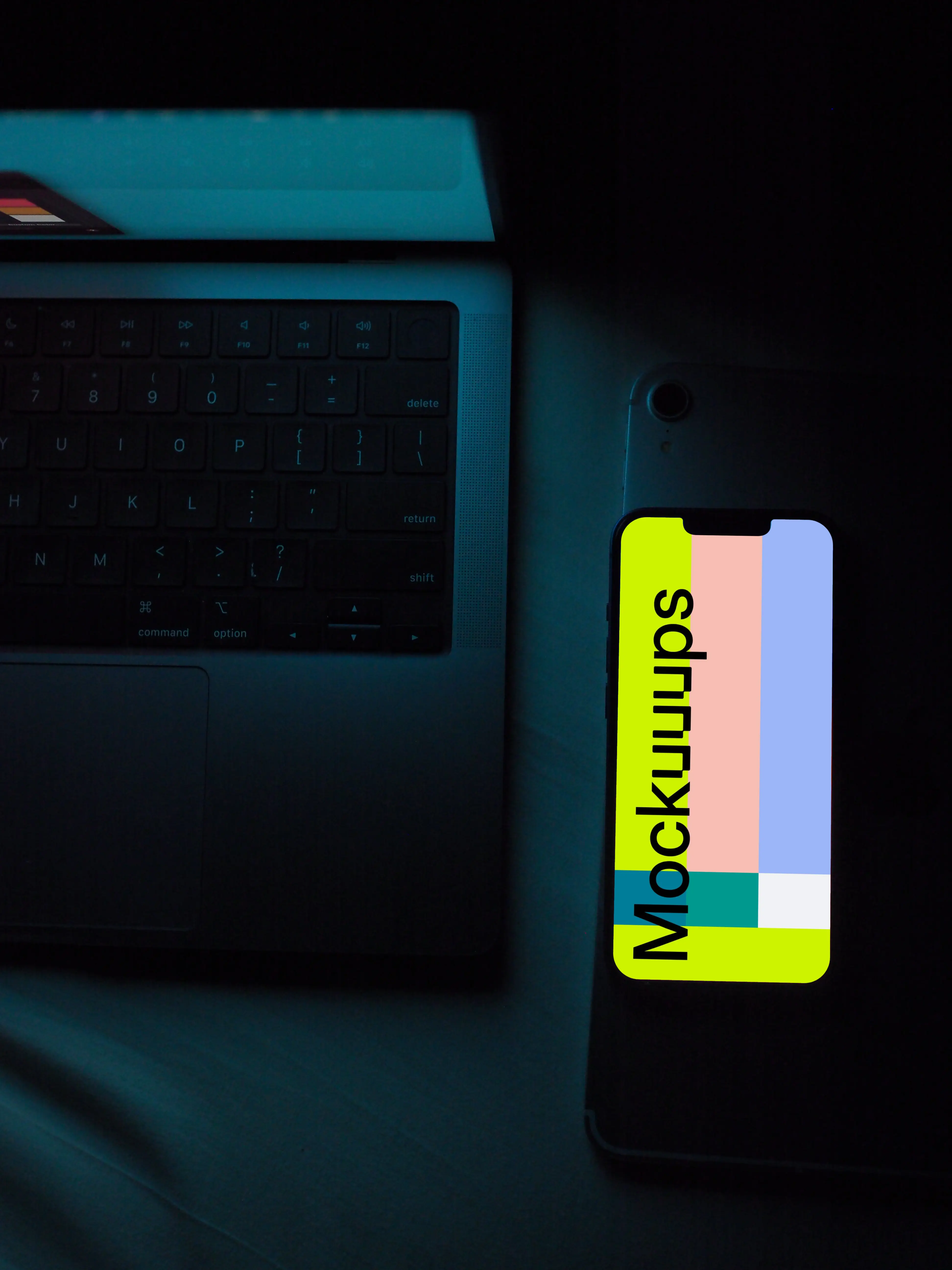 iPhone 13 mockup with a laptop