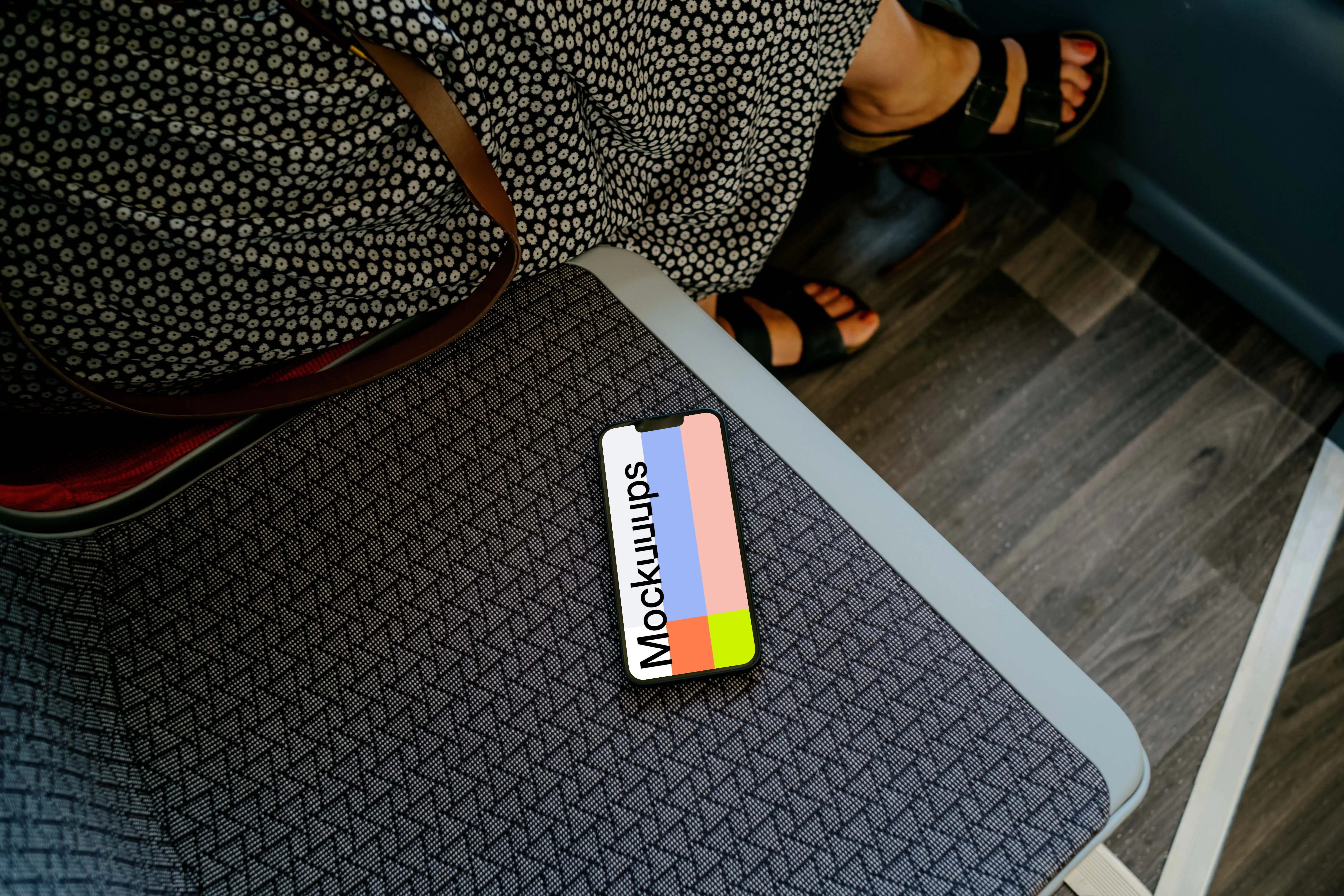 iPhone 13 on passenger seat