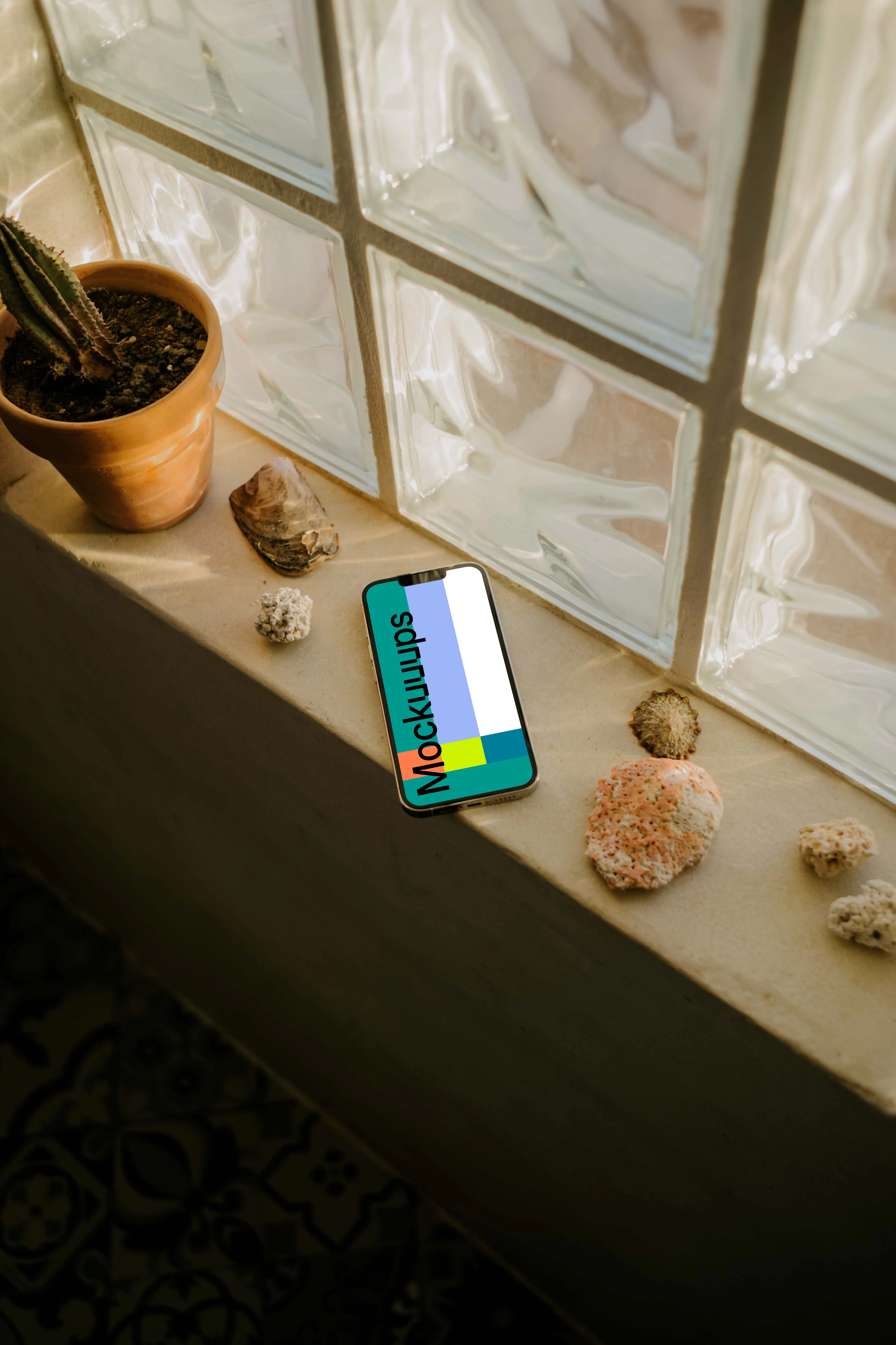 iPhone 13 Pro mockup on a window ledge