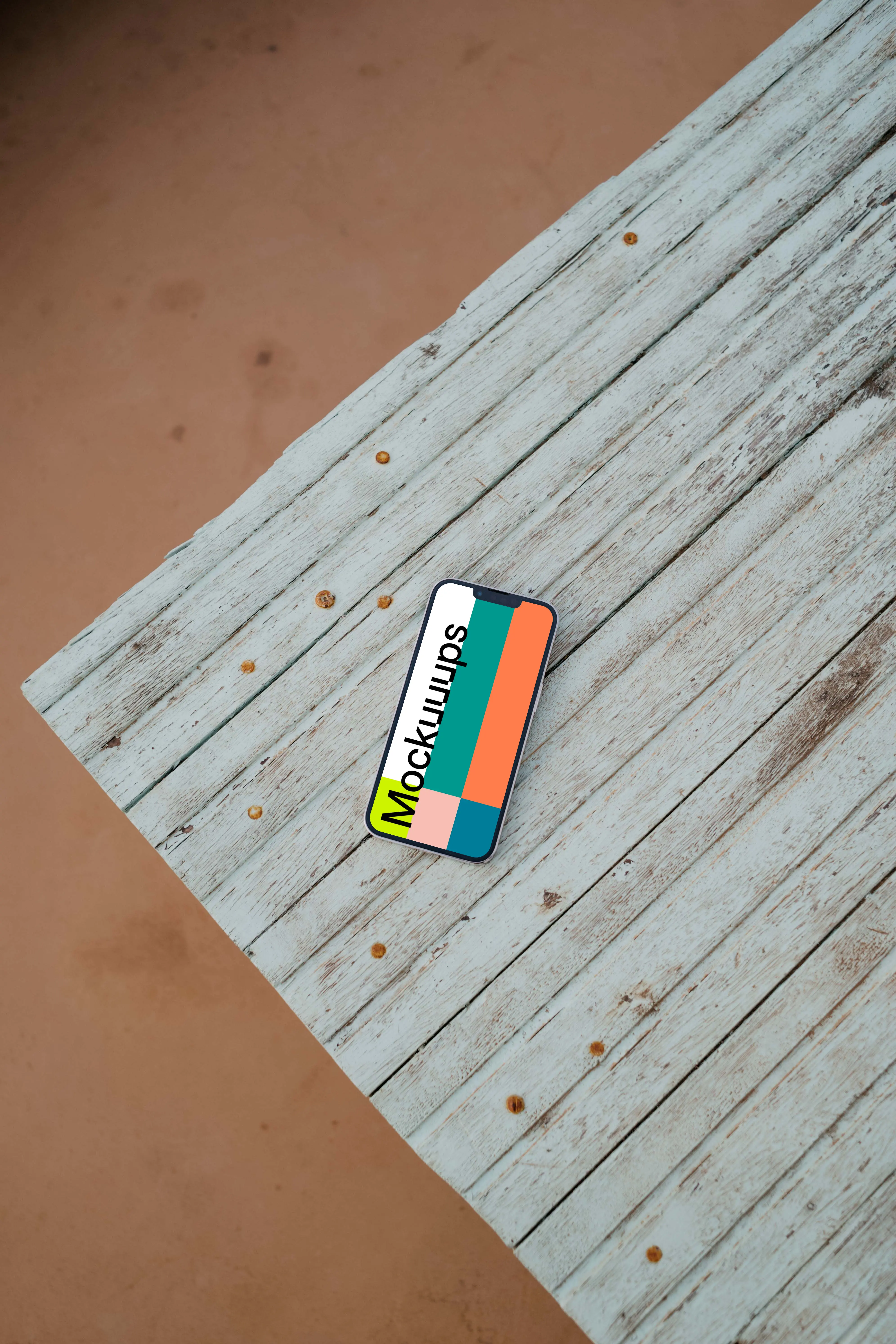 iPhone 13 Pro mockup on a wooden platform