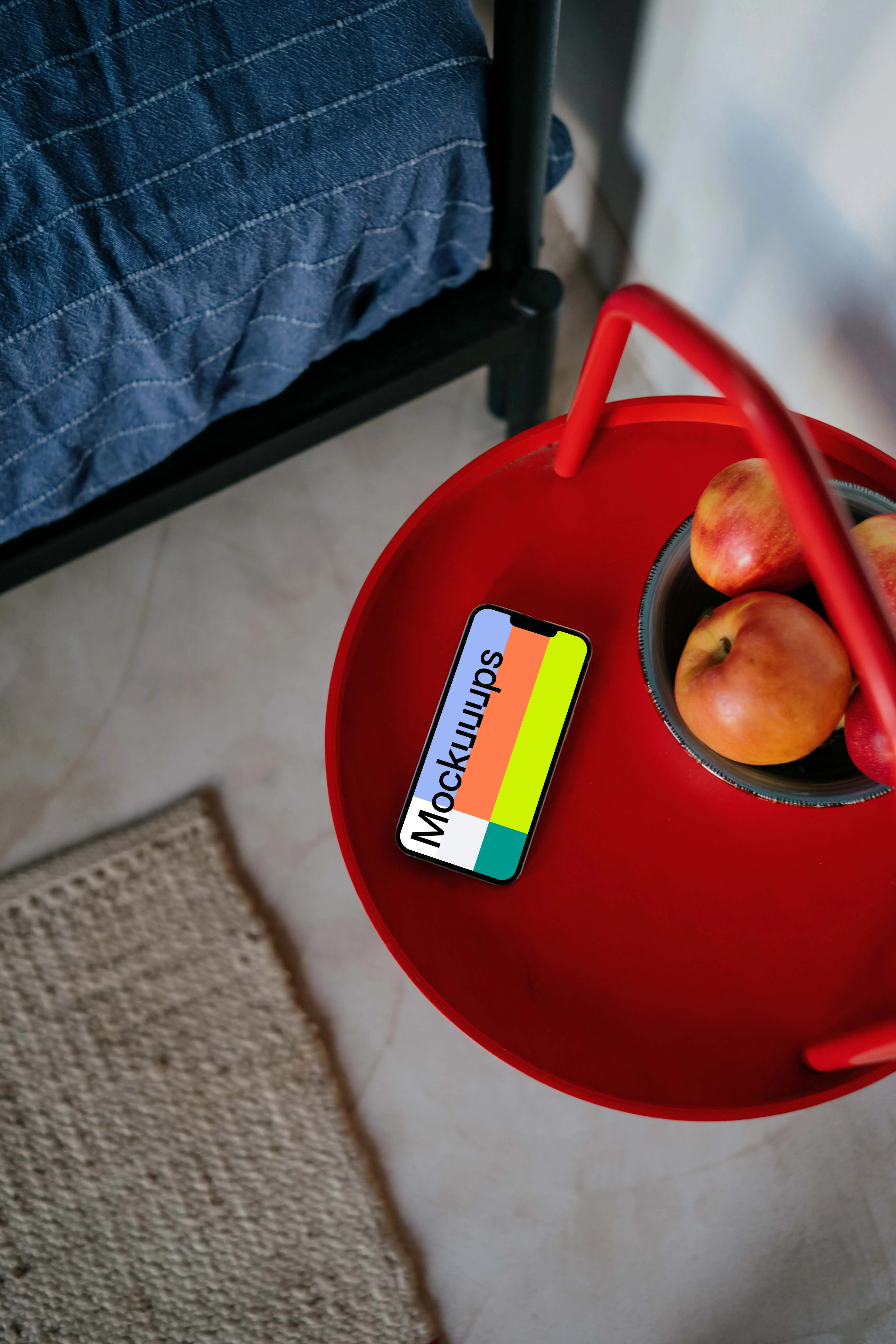  iPhone 13 Pro mockup placed next to a fruit bowl