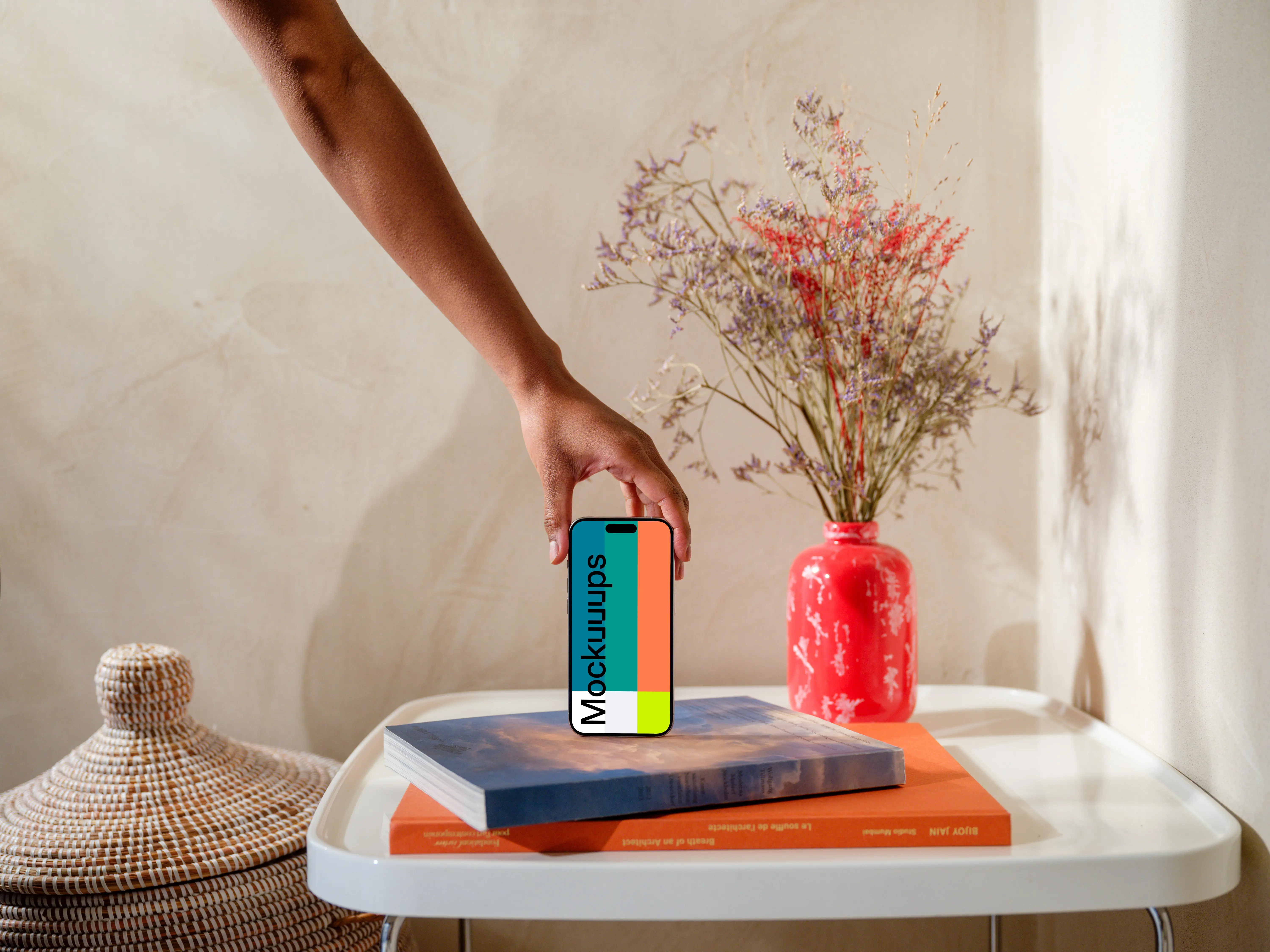 iPhone 15 Pro mockup in a woman's hand on a modern home setting