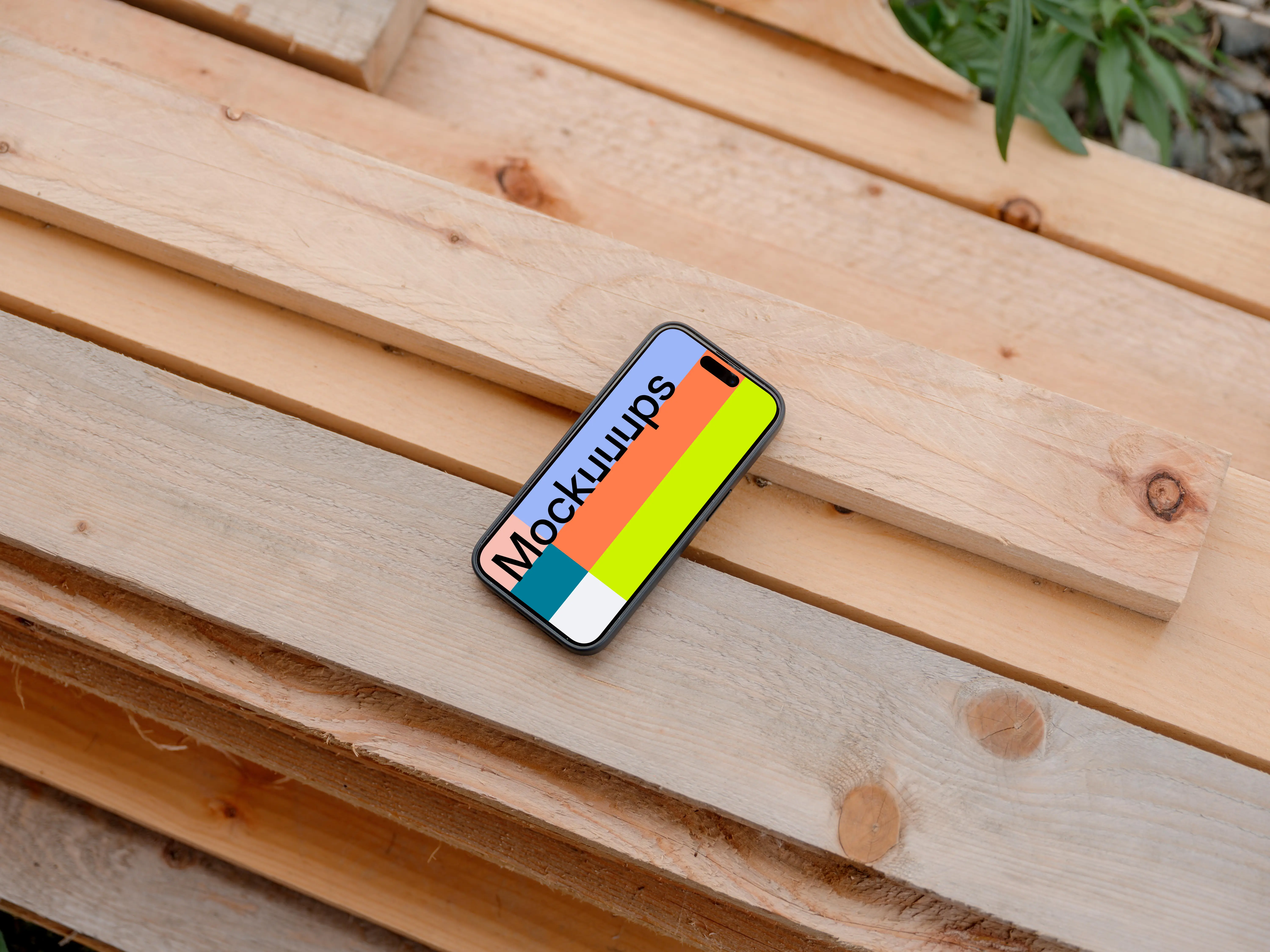 iPhone 15 Pro mockup on wooden boards