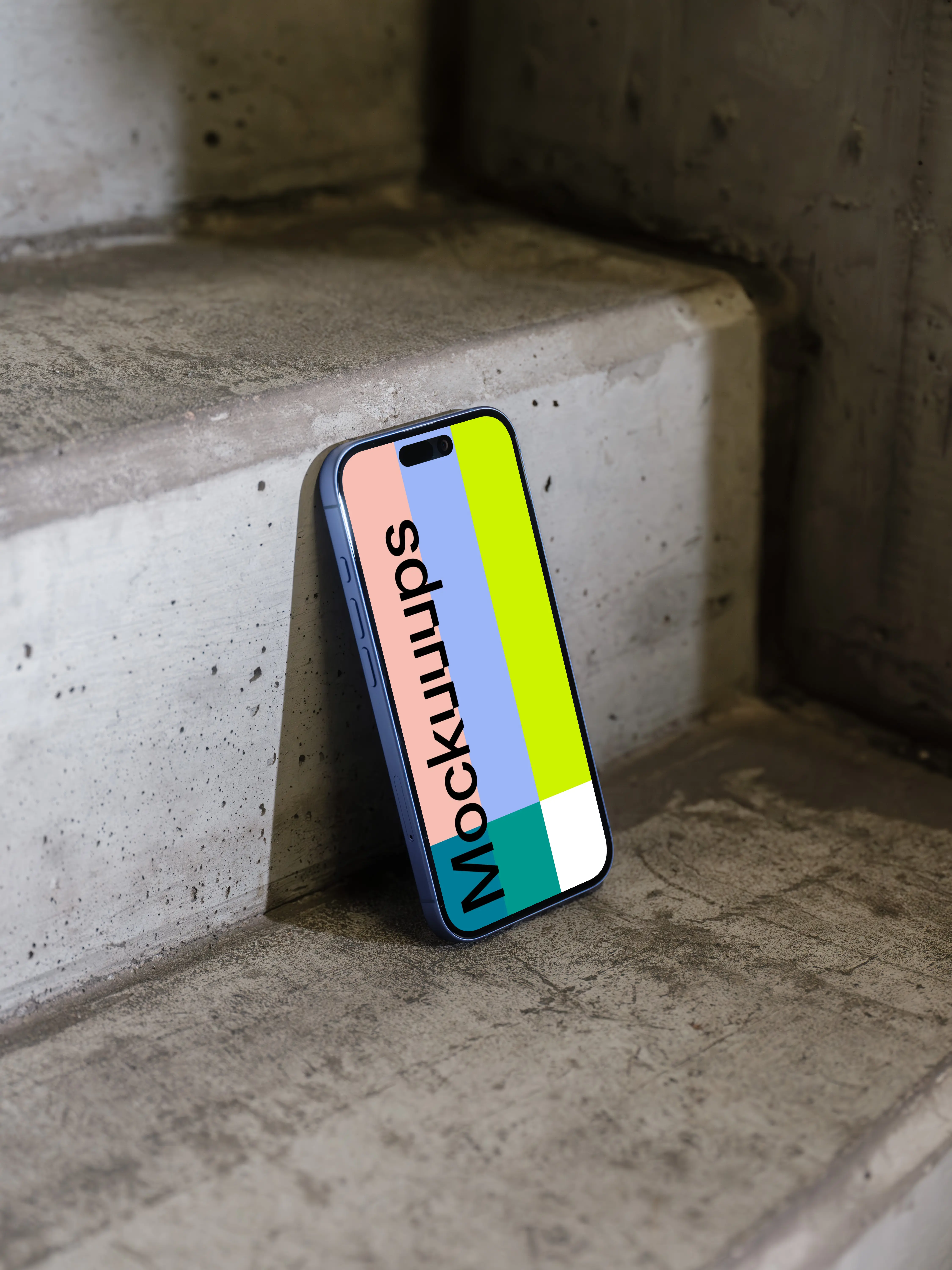 iPhone 16 mockup on a concrete step