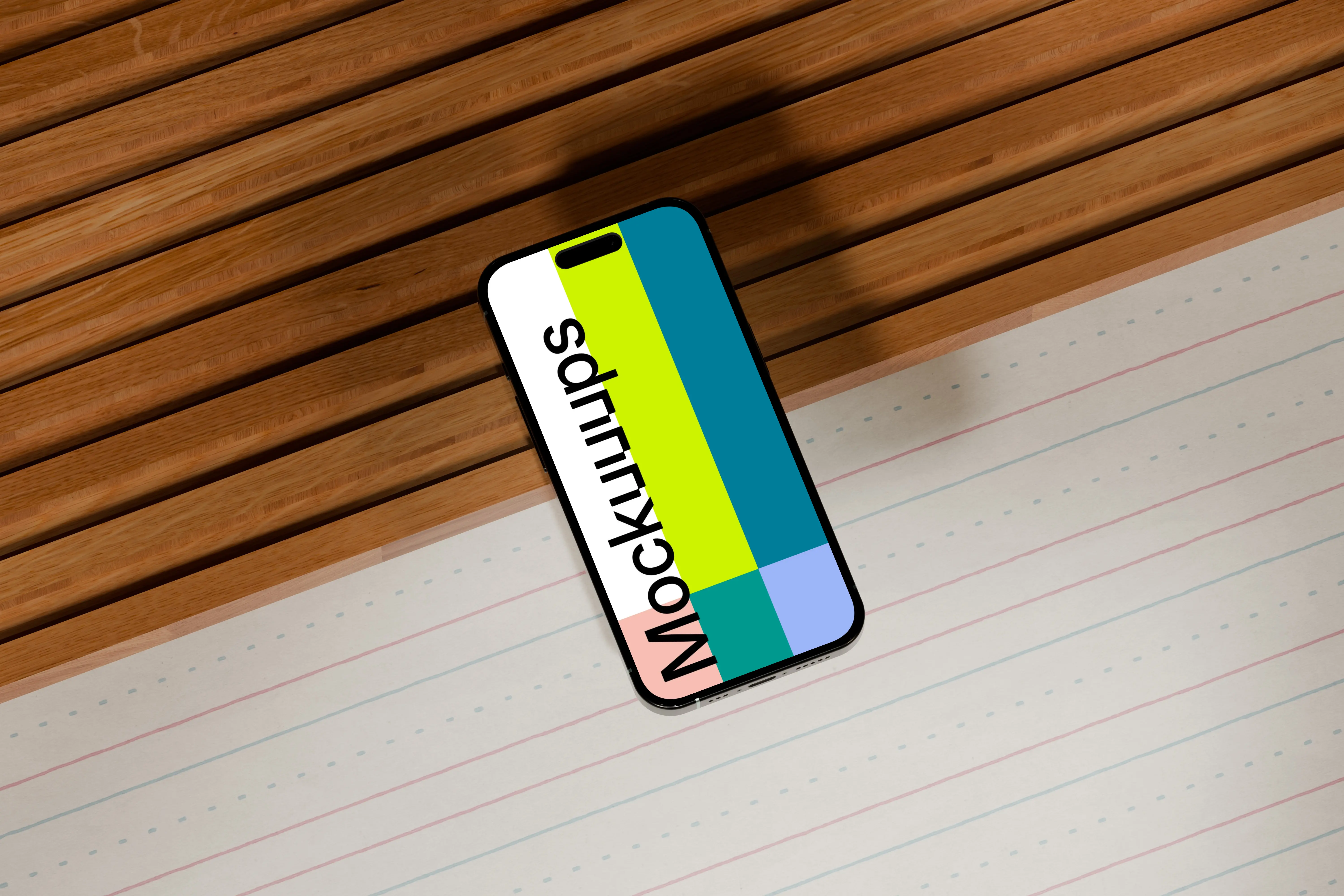 iPhone 16 mockup on a wooden desk