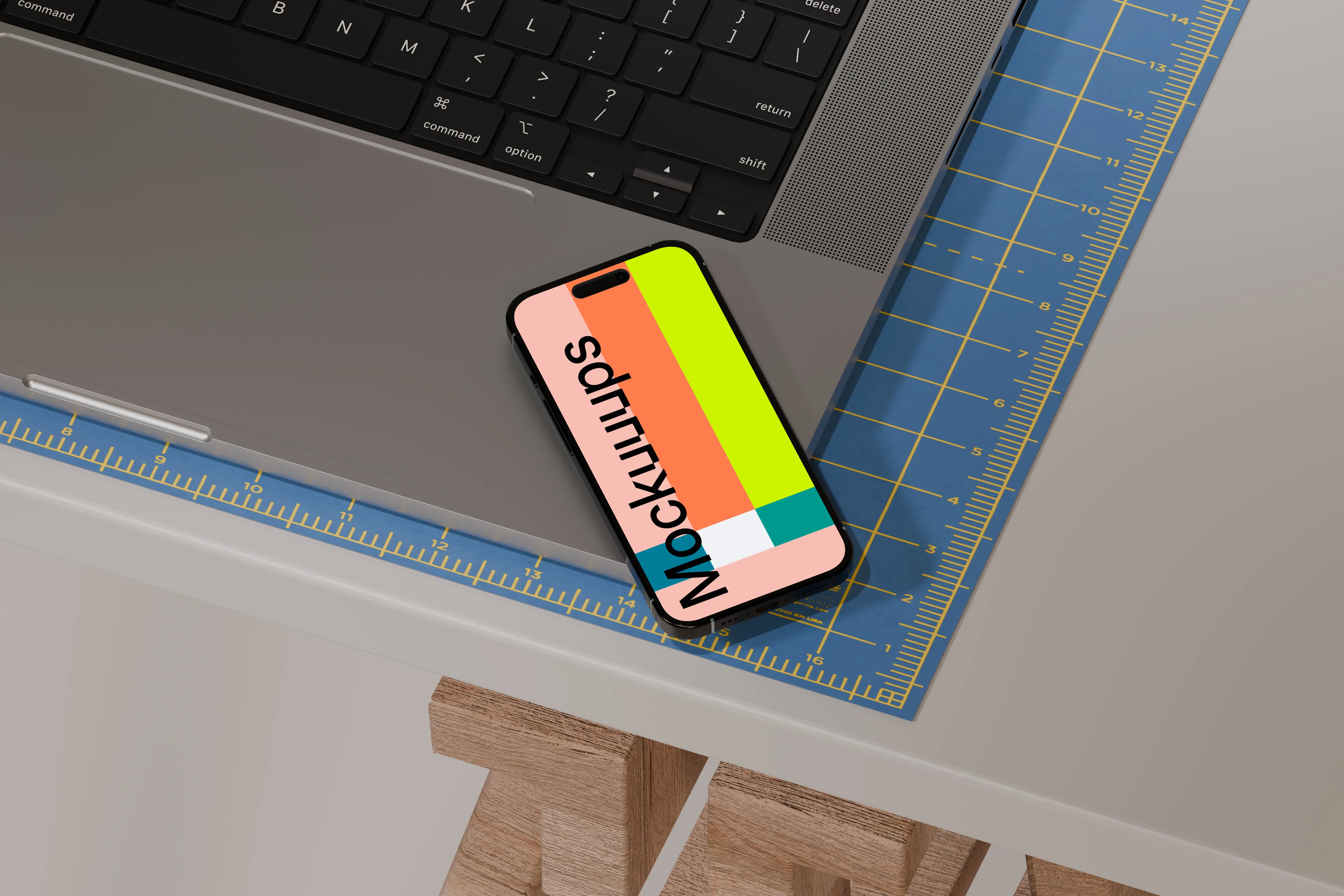 iPhone 16 mockup on designer's desk