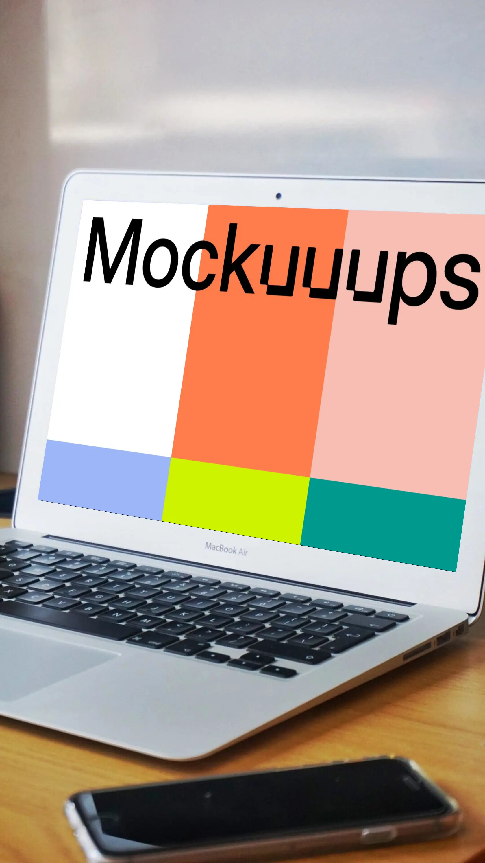 MacBook Air mockup on wooden desk