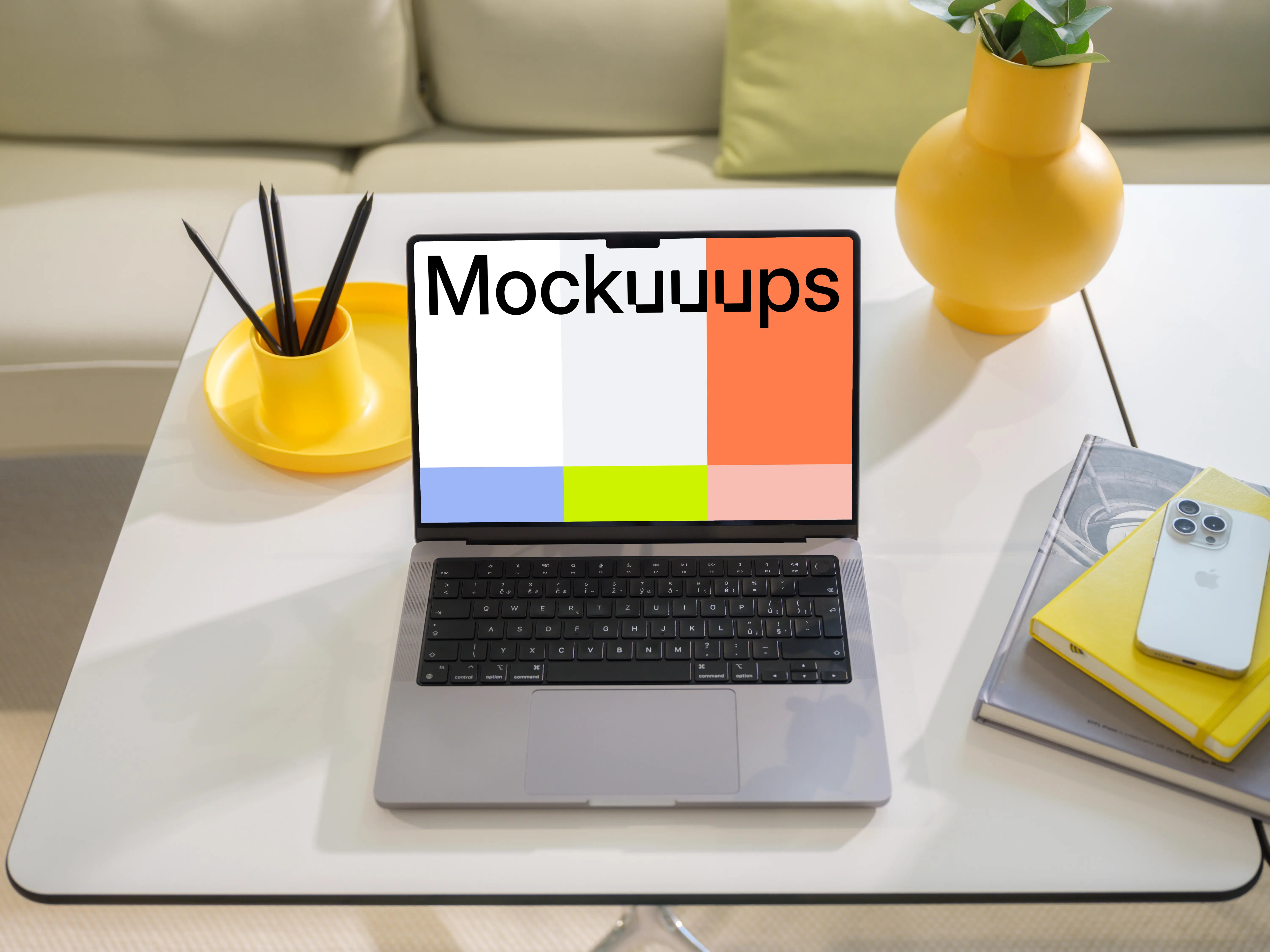 MacBook Pro 14-inch mockup on a modern white table