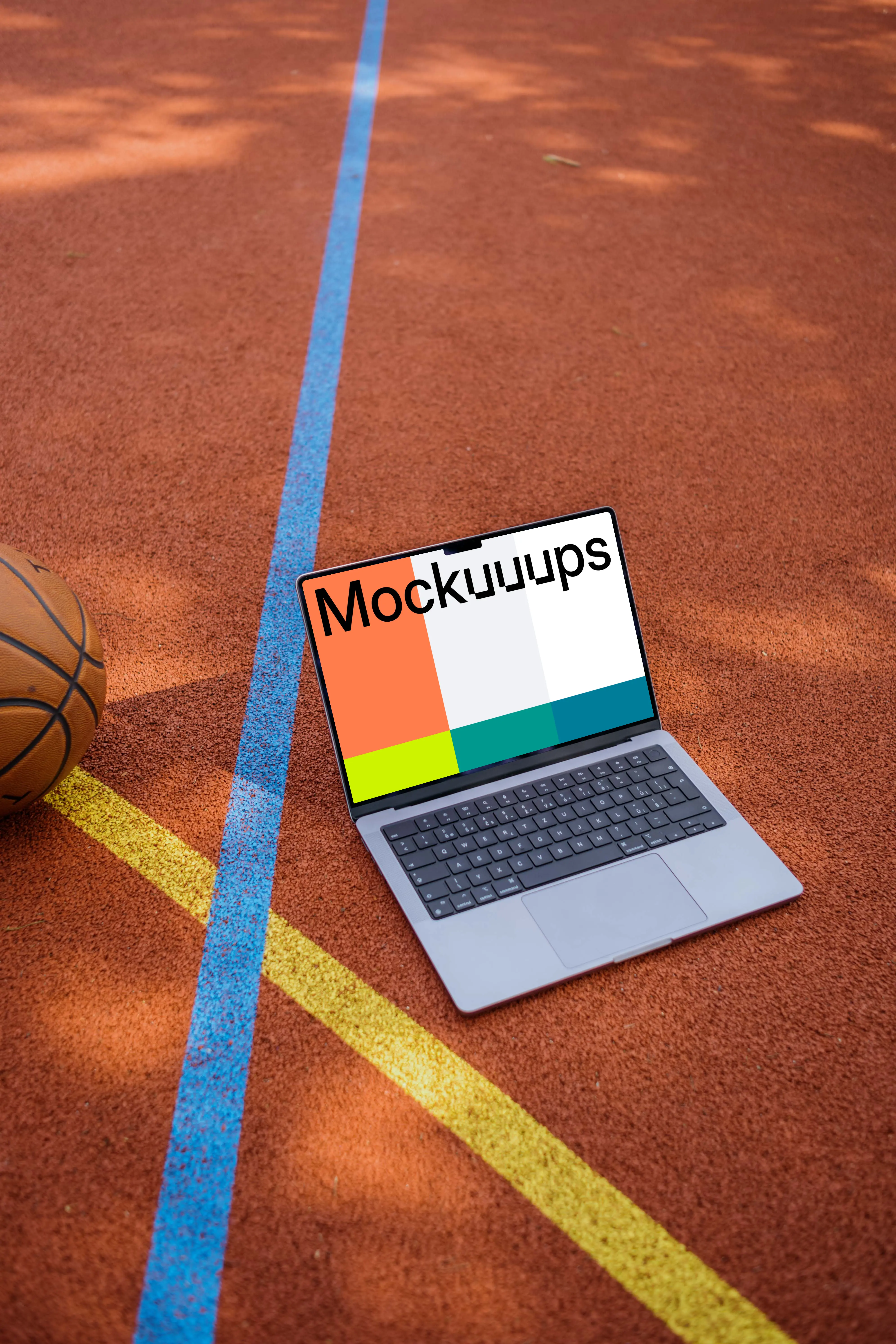 MacBook Pro 14 mockup on a basketball playground