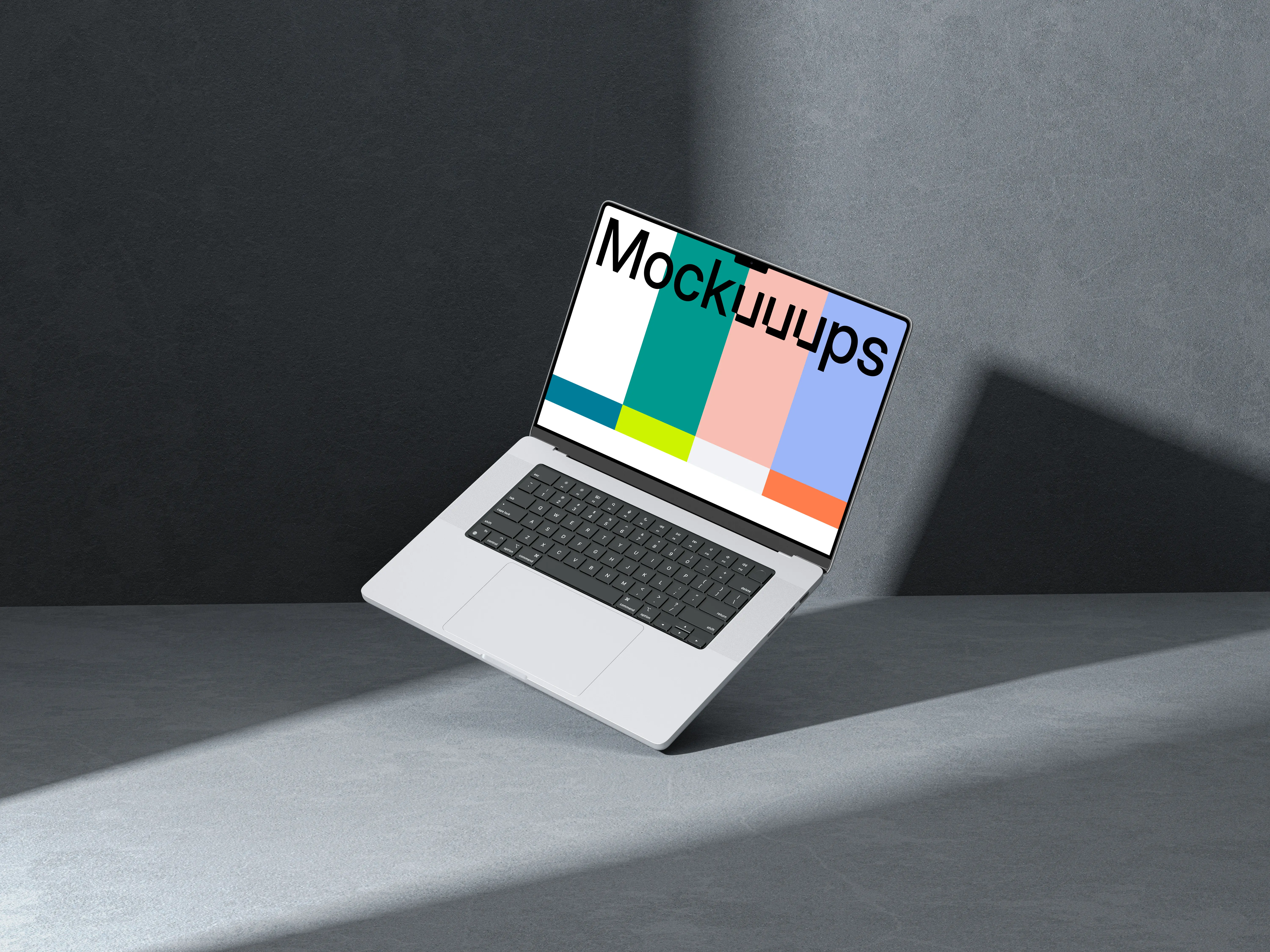 MacBook Pro 16 inch mockup on a textured gray surface with dramatic lighting