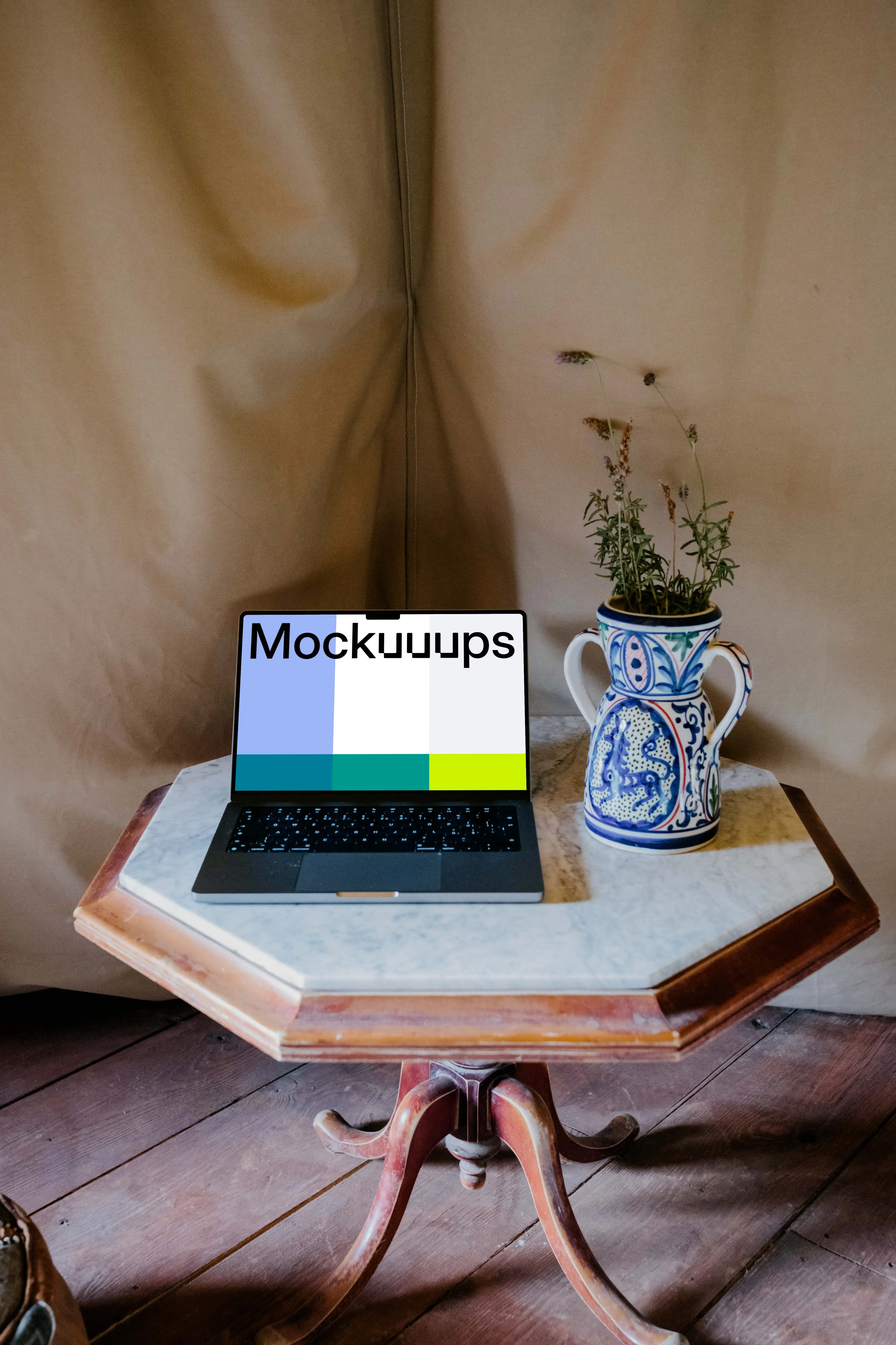 MacBook Pro mockup next to a potted plant