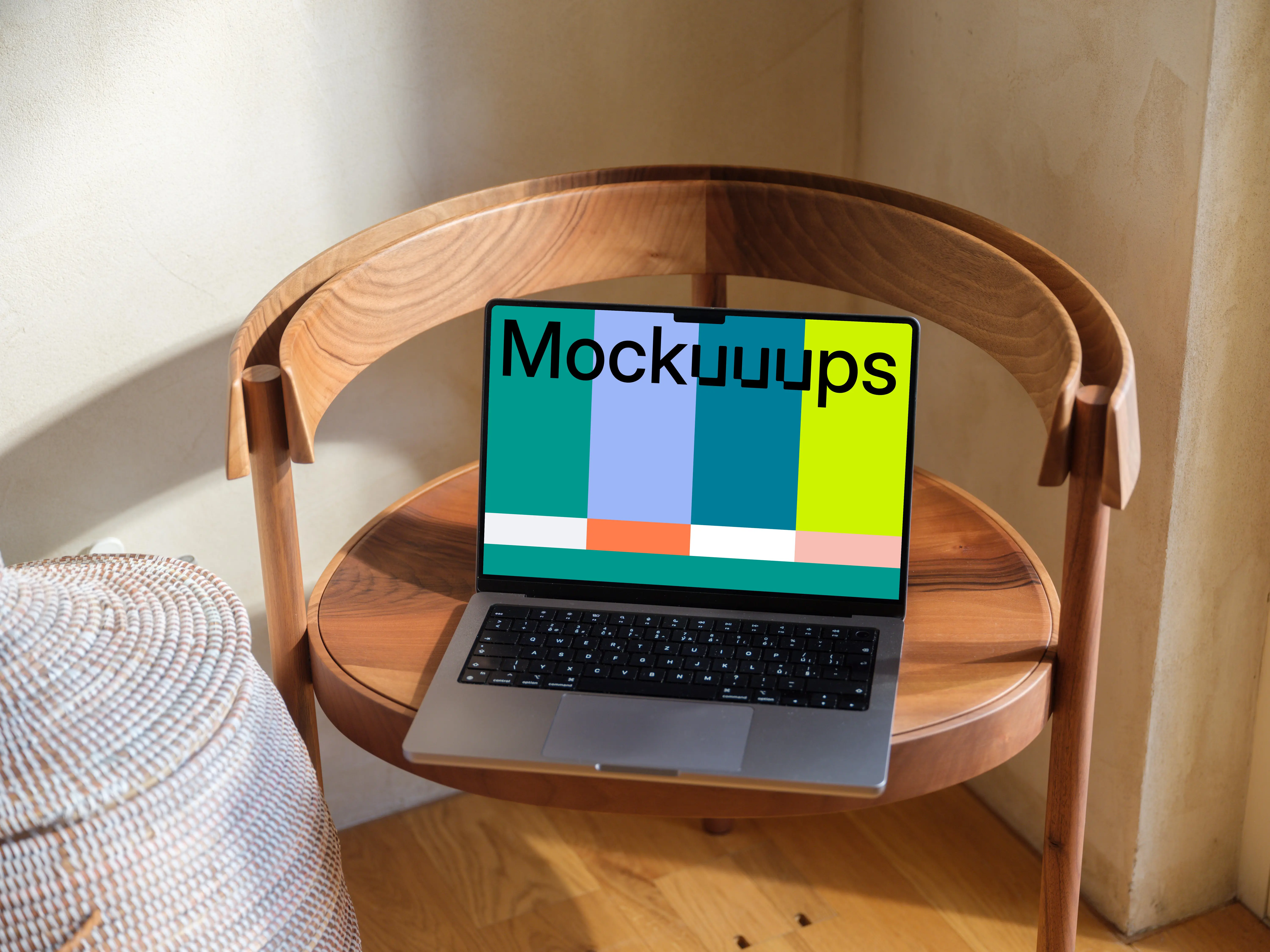 MacBook Pro mockup on a round wooden table