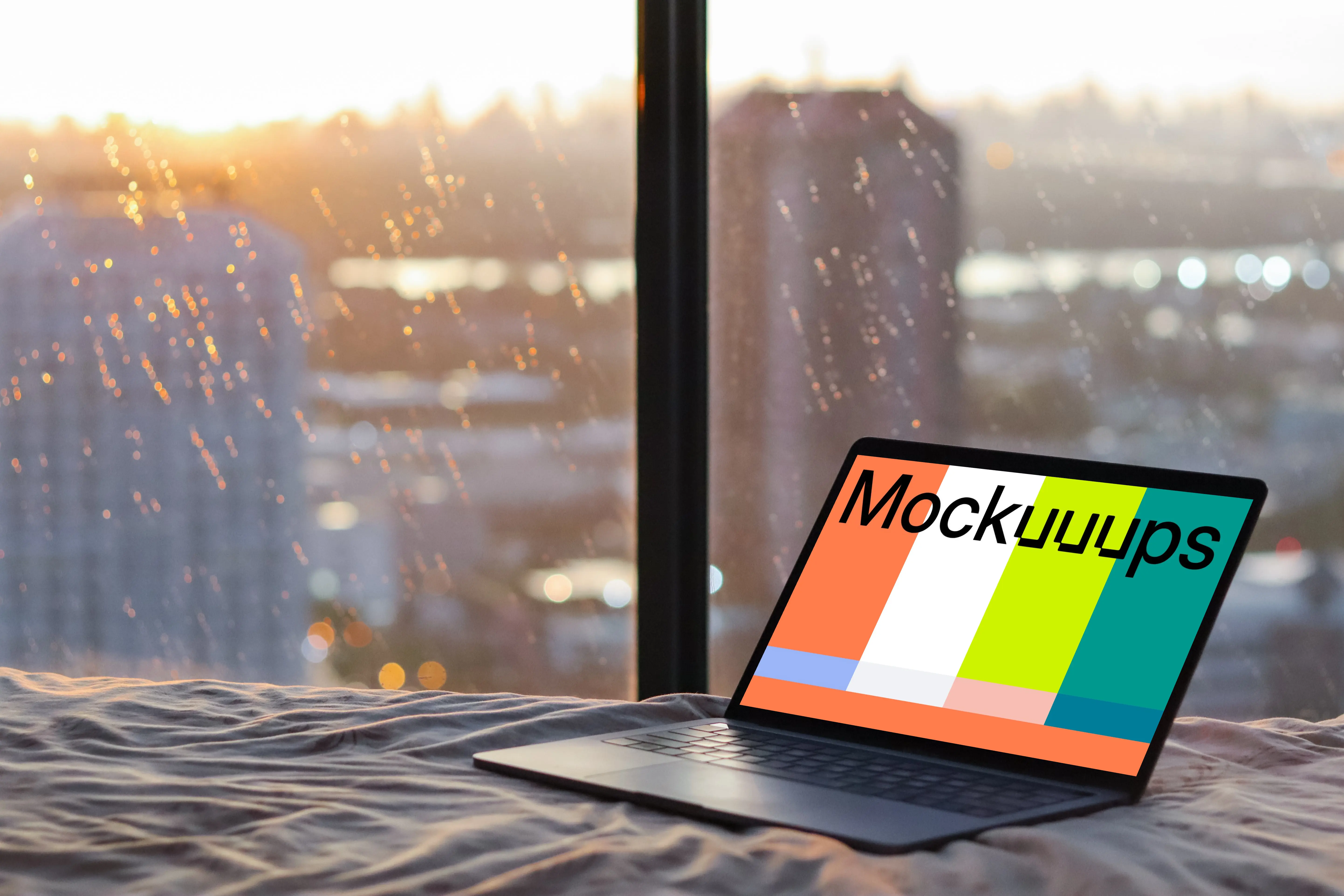 MacBook Pro mockup on bed