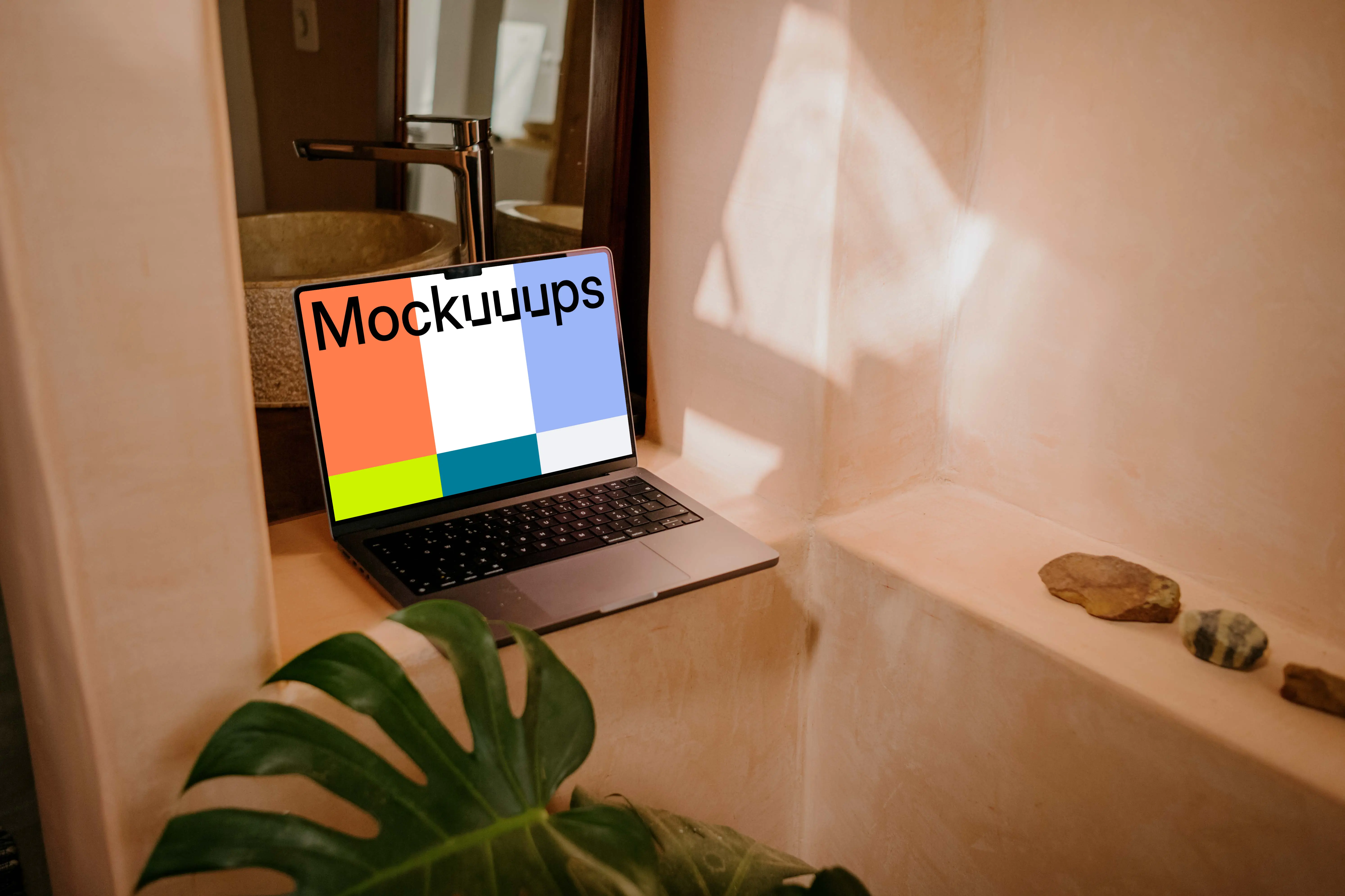 MacBook Pro mockup under a faucet
