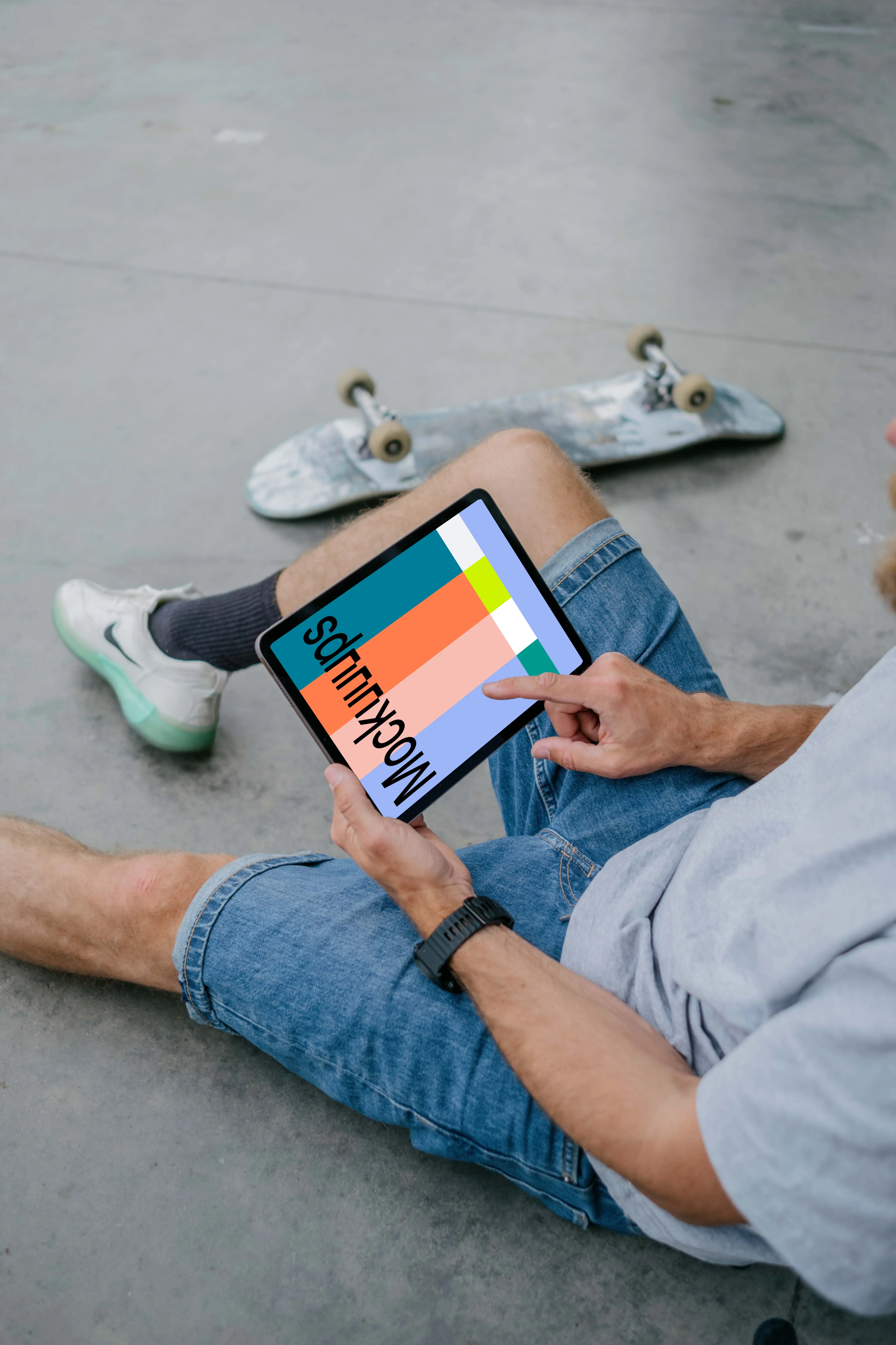 Male hand typing on an iPad Air mockup