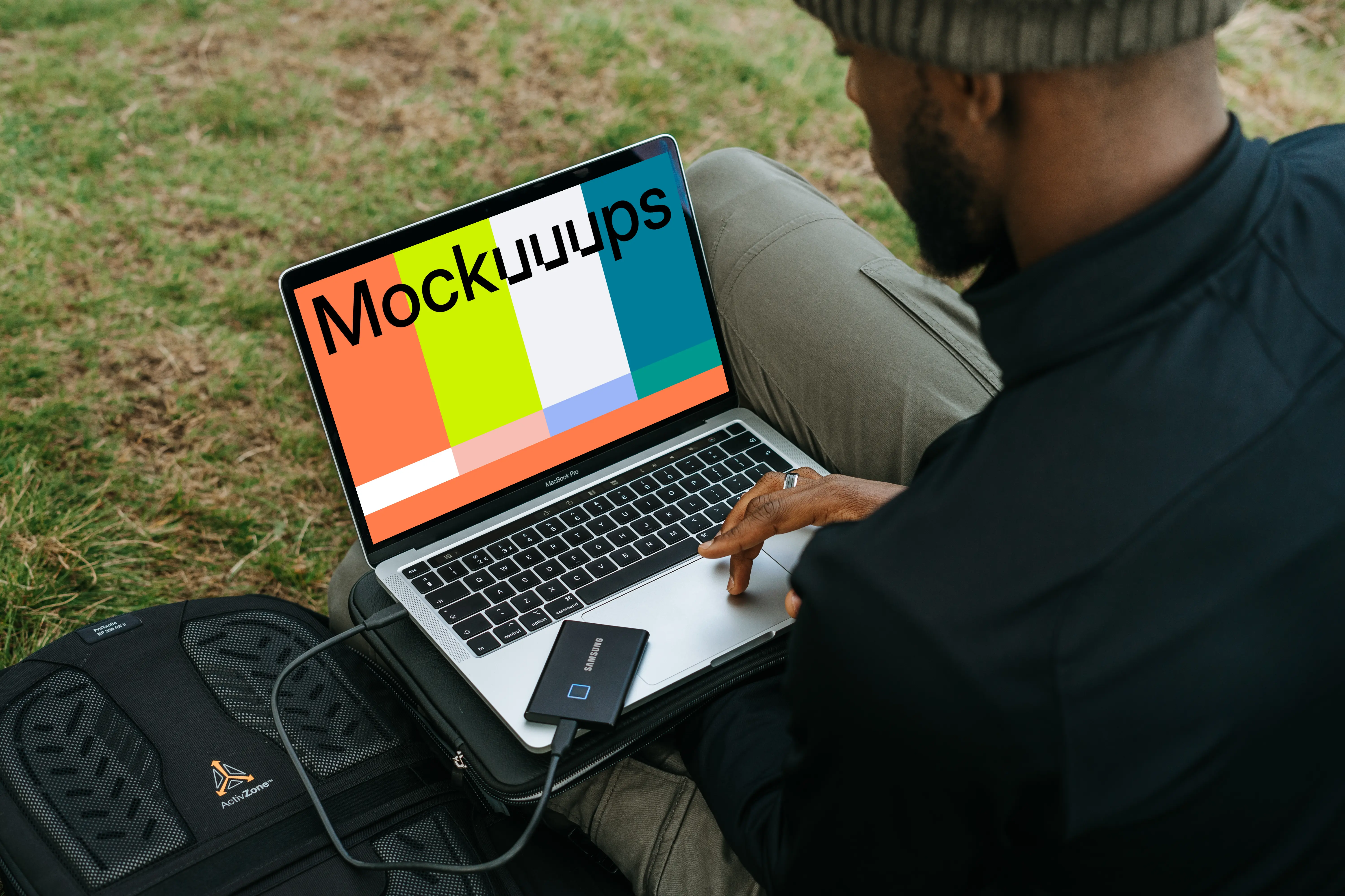 Man woking on MacBook Pro mockup