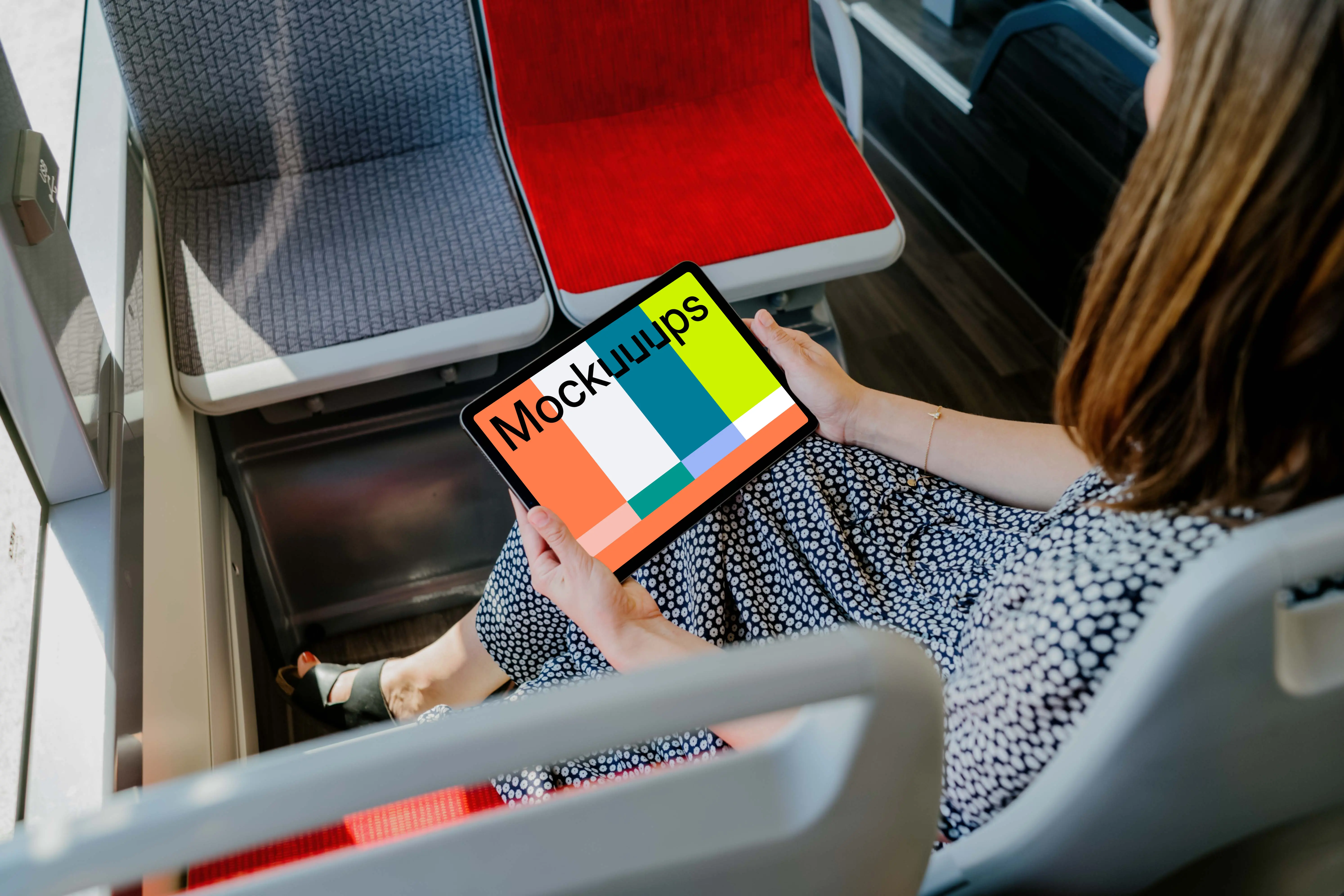 Person reading on an iPad Air mockup