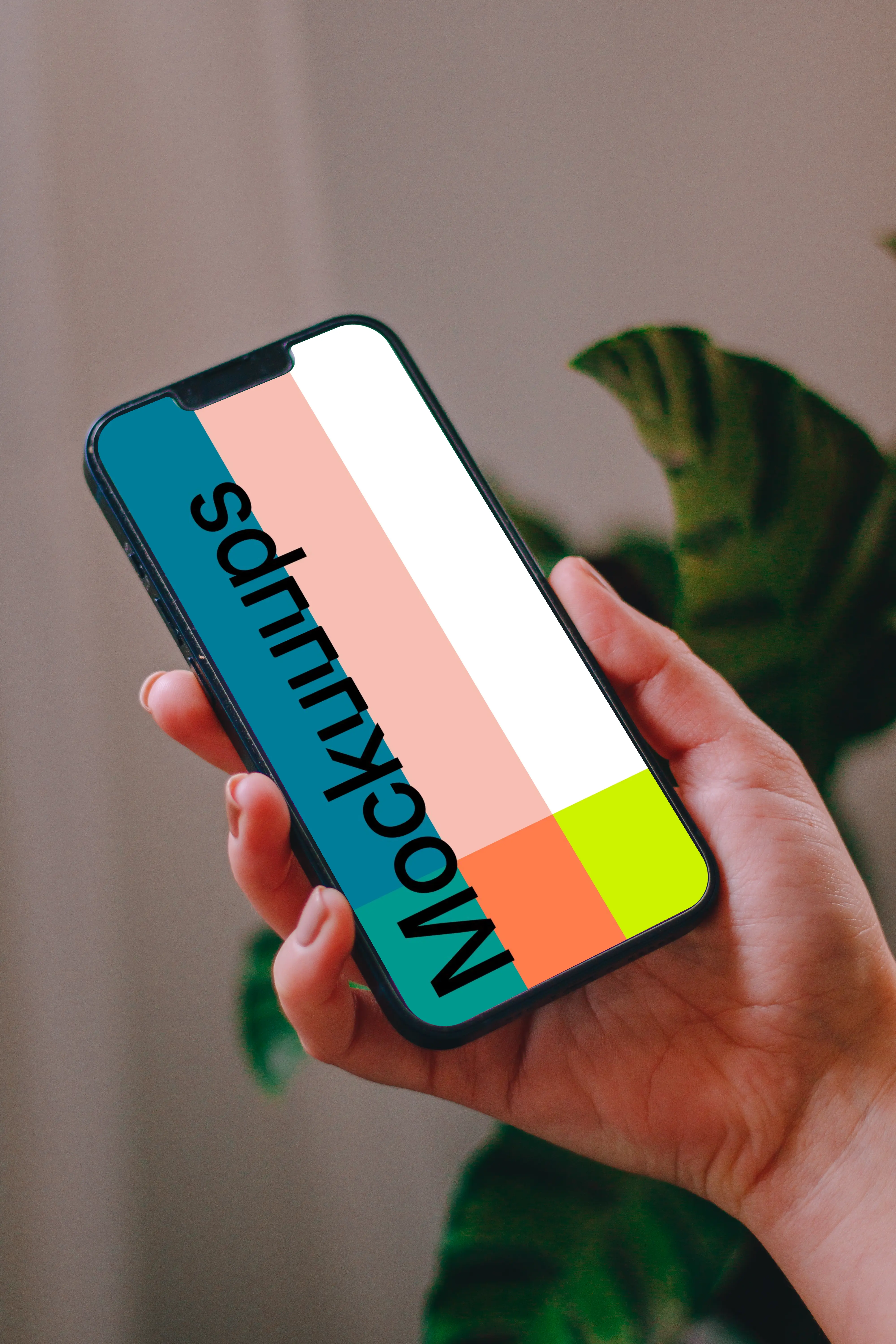 Person using an iPhone 13 mockup