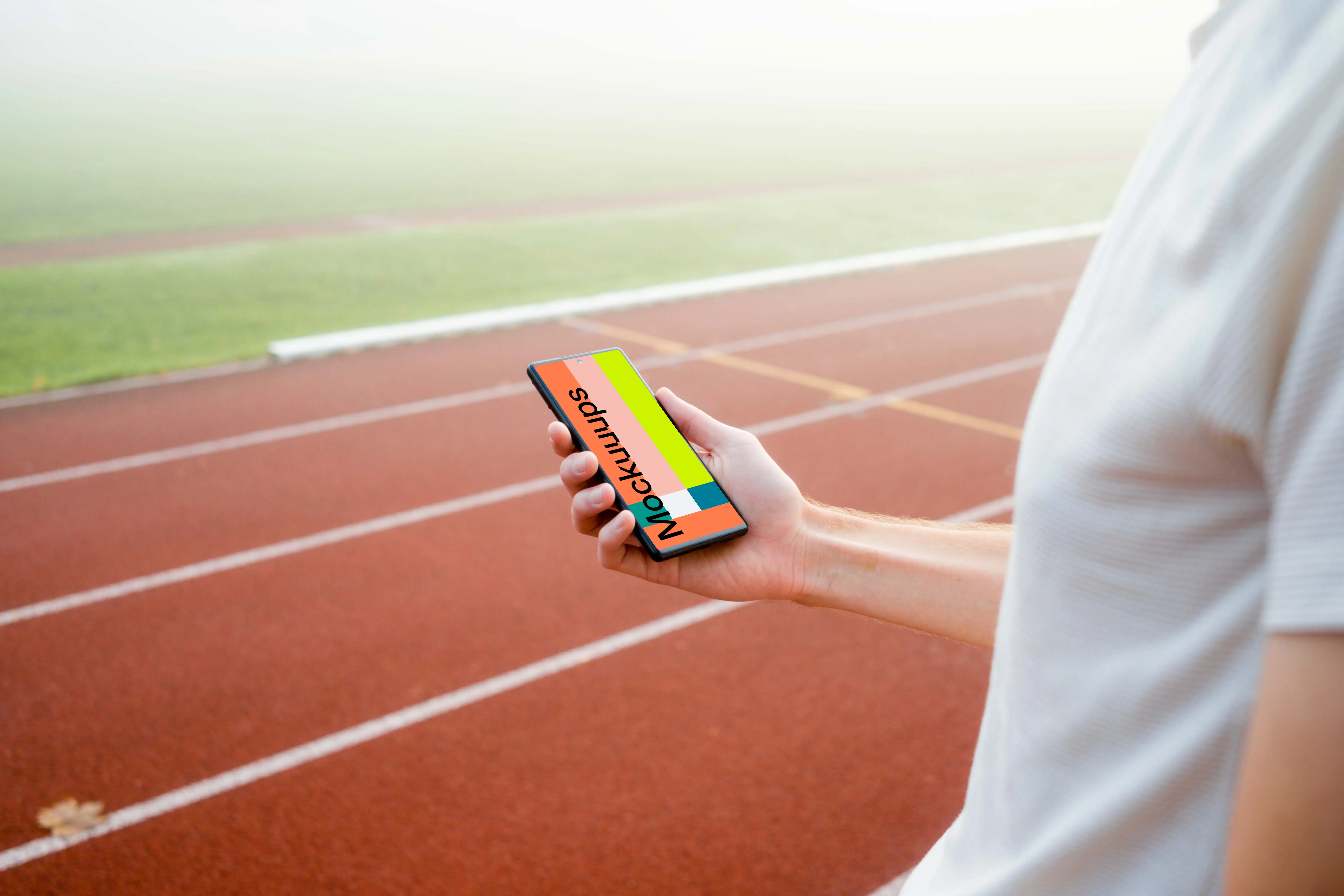 Runner holding a Google Pixel 6 mockup